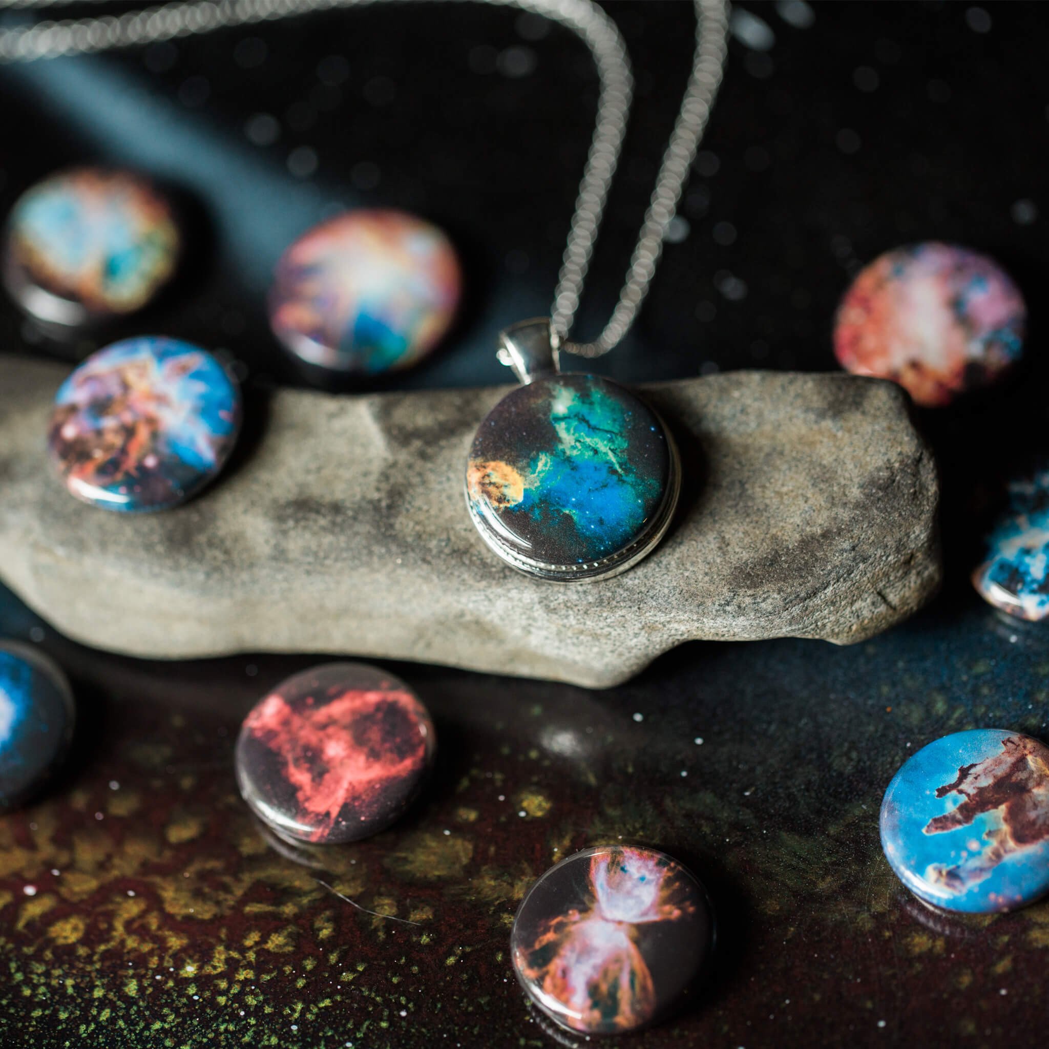 Interchangeable Nebula Necklace featuring 10 stunning nebula images, available in silver or bronze tone, with a strong magnetic design.