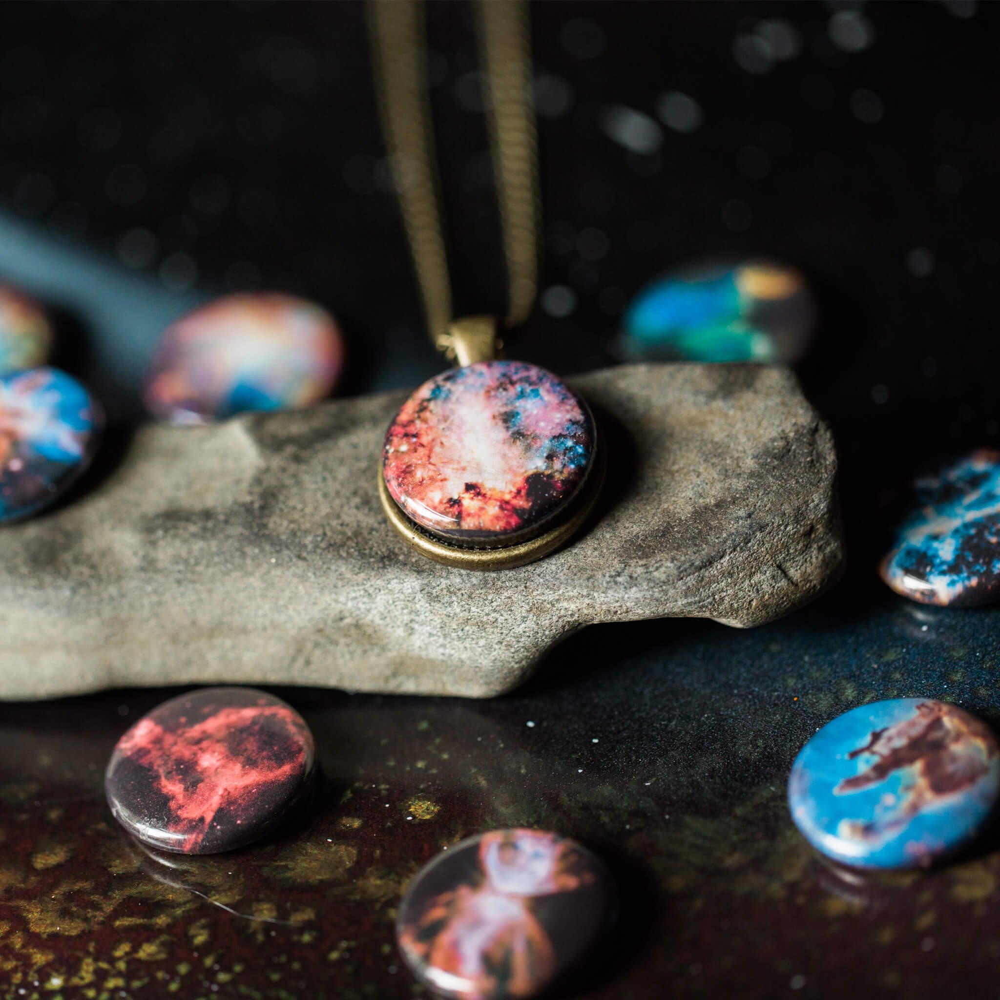 Interchangeable Nebula Necklace featuring 10 stunning nebula images, available in silver or bronze tone, with a strong magnetic design.