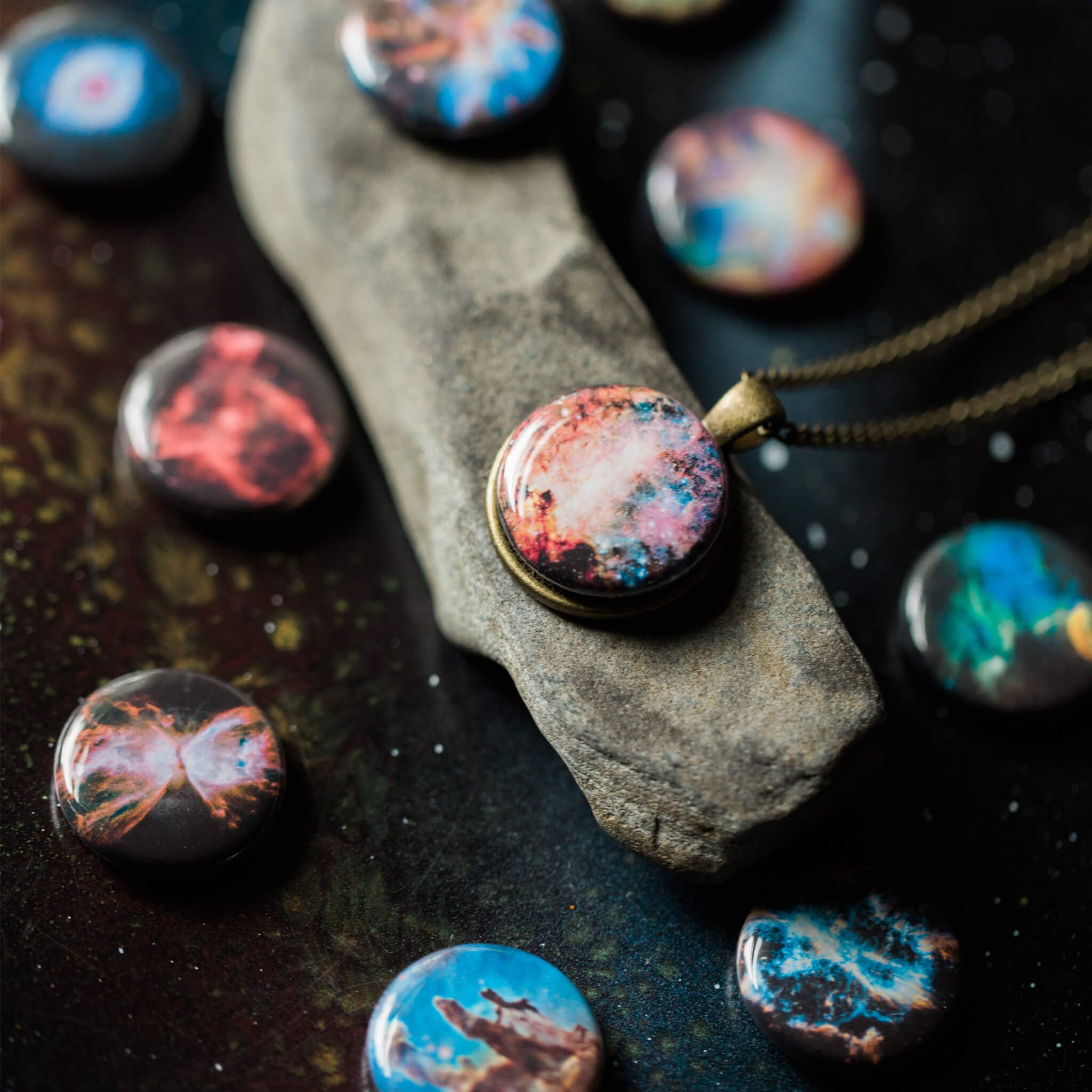 Interchangeable Nebula Necklace featuring 10 stunning nebula images, available in silver or bronze tone, with a strong magnetic design.