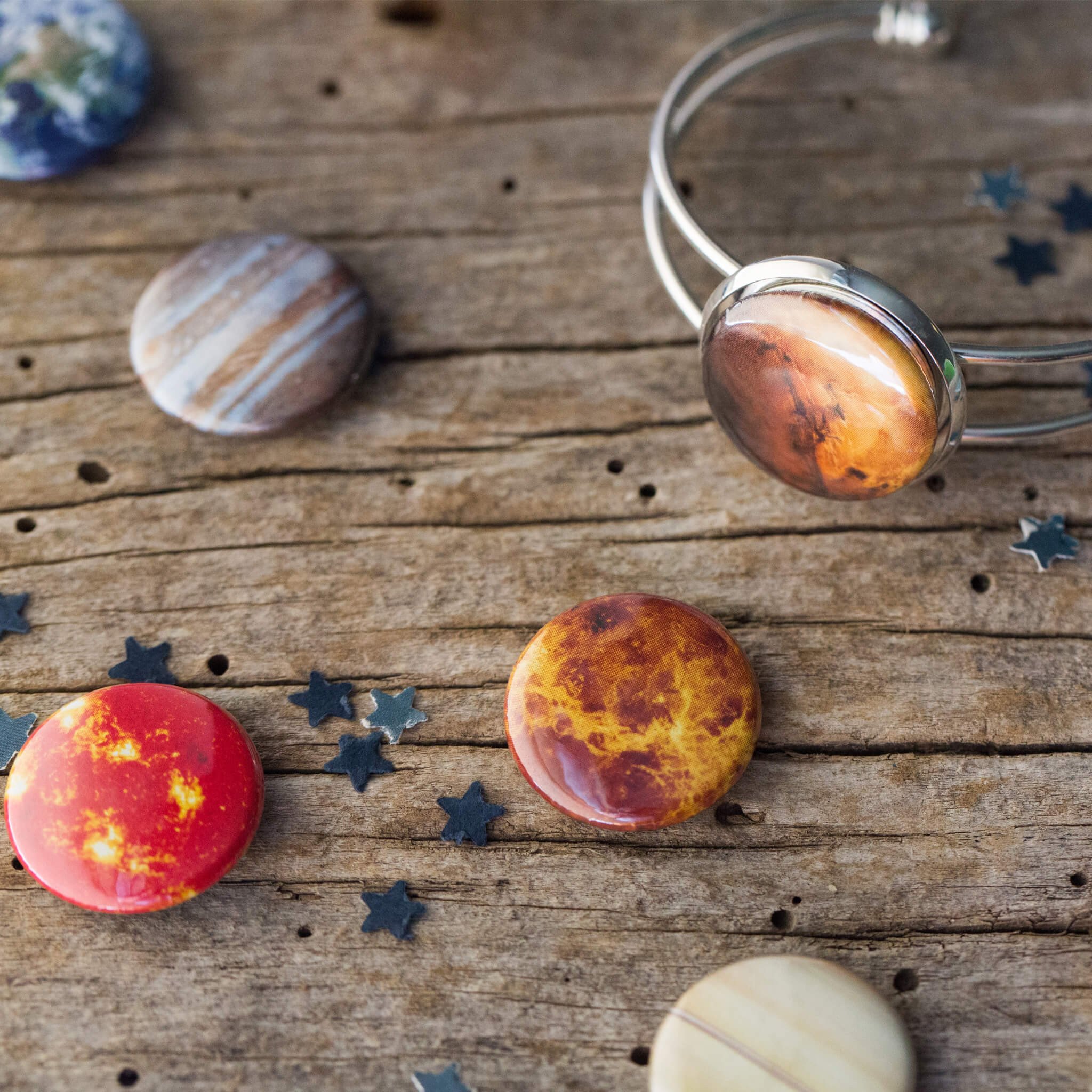 Interchangeable Solar System Cuff Bracelet featuring 8 planets, Moon, and Sun in antique bronze or silver-tone finish.