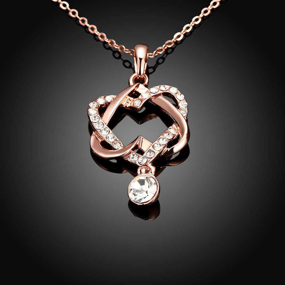 Intertwined Heart Necklace in 18K Rose Gold Plated with Crystals, elegantly designed and presented in a white gift box.