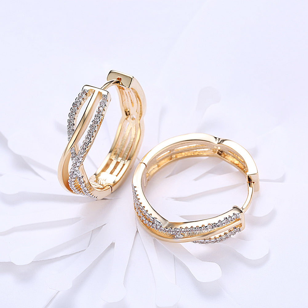 Intertwined Inception Twist 0.90" Hoop Earring in 18K Gold Plated, showcasing its elegant design and luxurious finish.