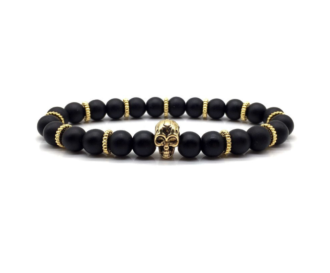 Intuitive Steel Bracelet featuring a black and gold skull design with lava stone beads, showcasing its elegant and unique style.