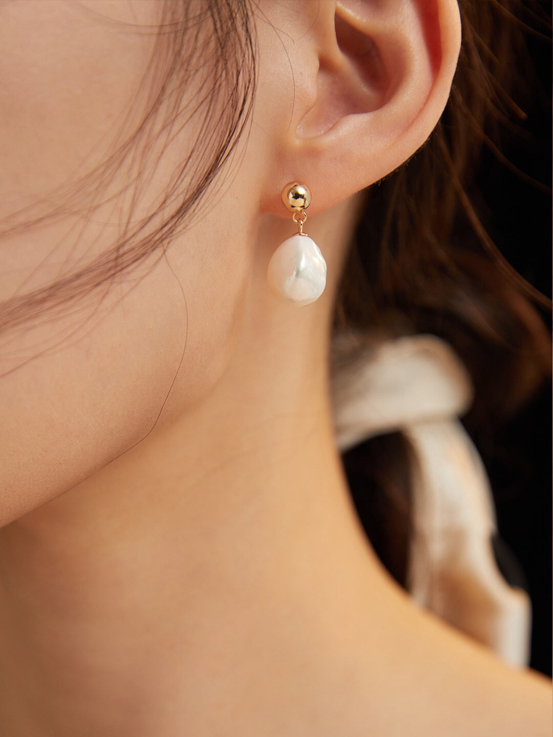 Elegant Irregular Baroque Pearls Earrings featuring unique shapes and gold vermeil setting, perfect for any occasion.