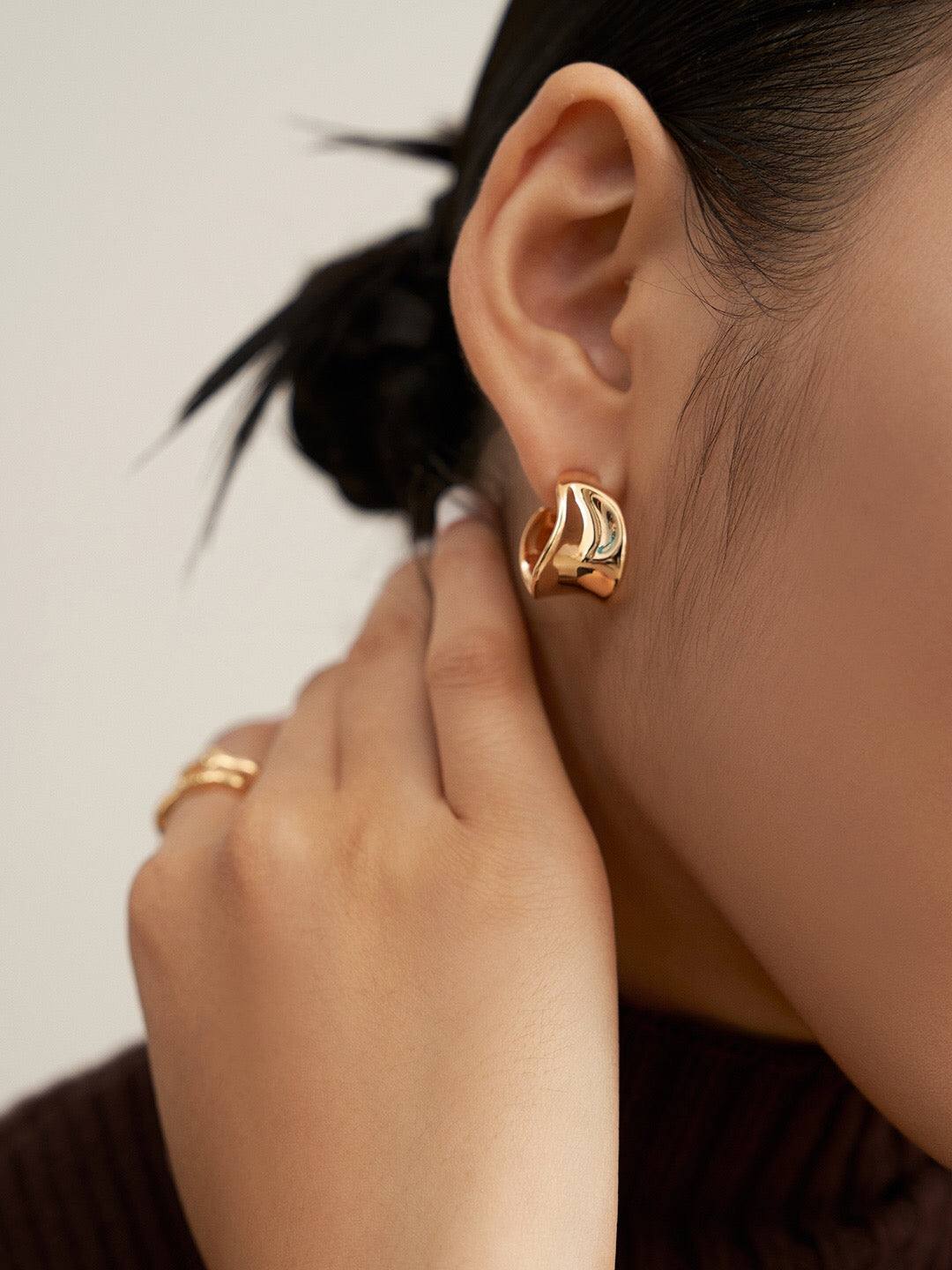 A pair of handmade Irregular Concave Convex Earrings crafted from sterling silver with a gold vermeil finish, showcasing a unique design.