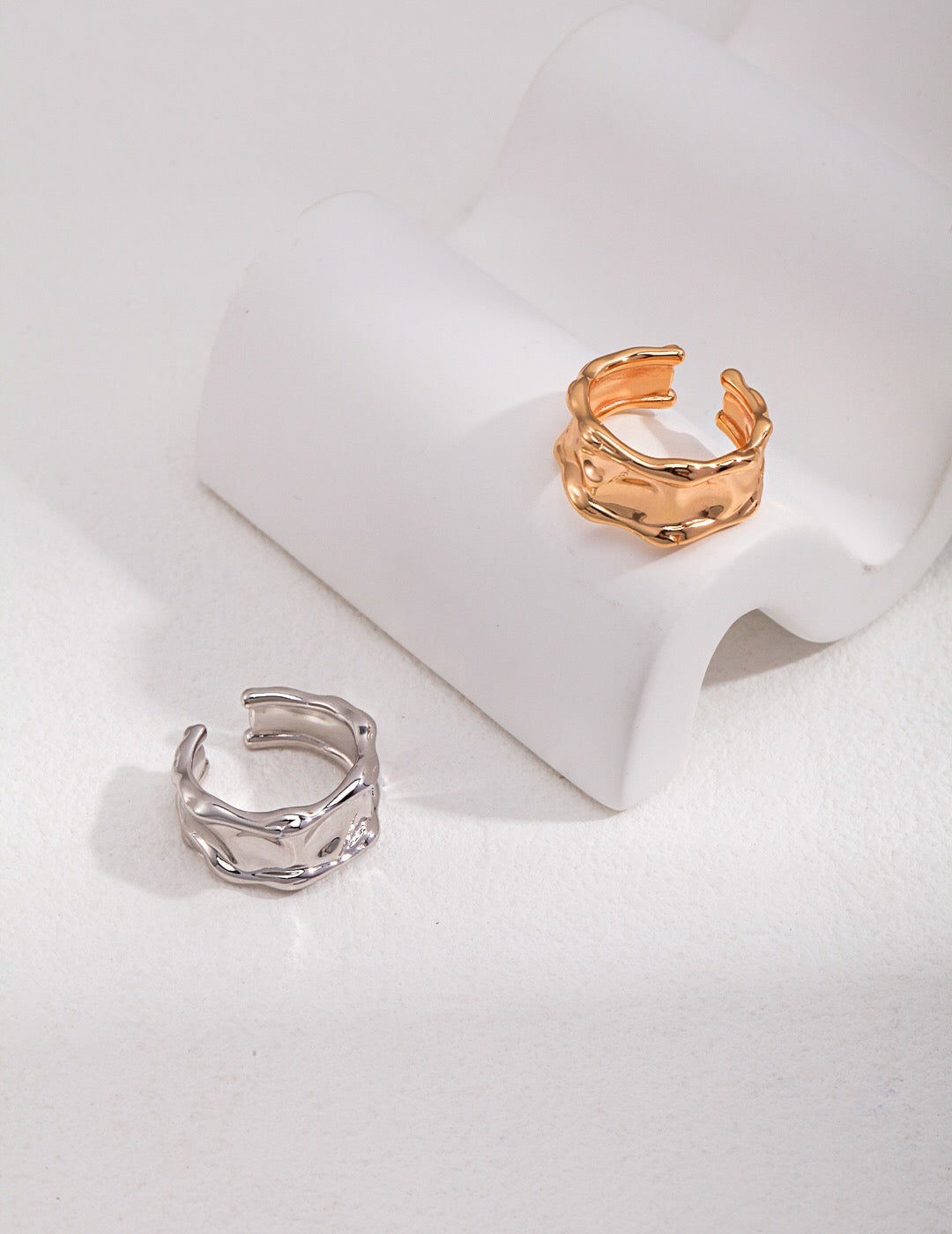 Irregular Lava Wide Face Ring made of sterling silver with gold vermeil finish, showcasing a unique textured design.