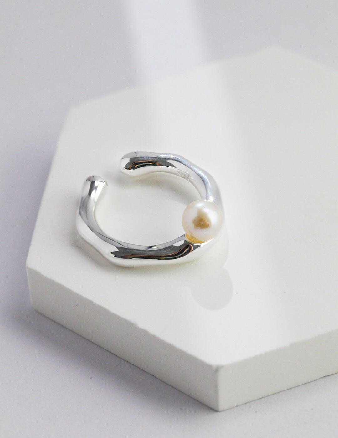 A stunning Irregular Shaped Pearl Ring featuring a natural pearl set in gold vermeil, showcasing its unique design and craftsmanship.