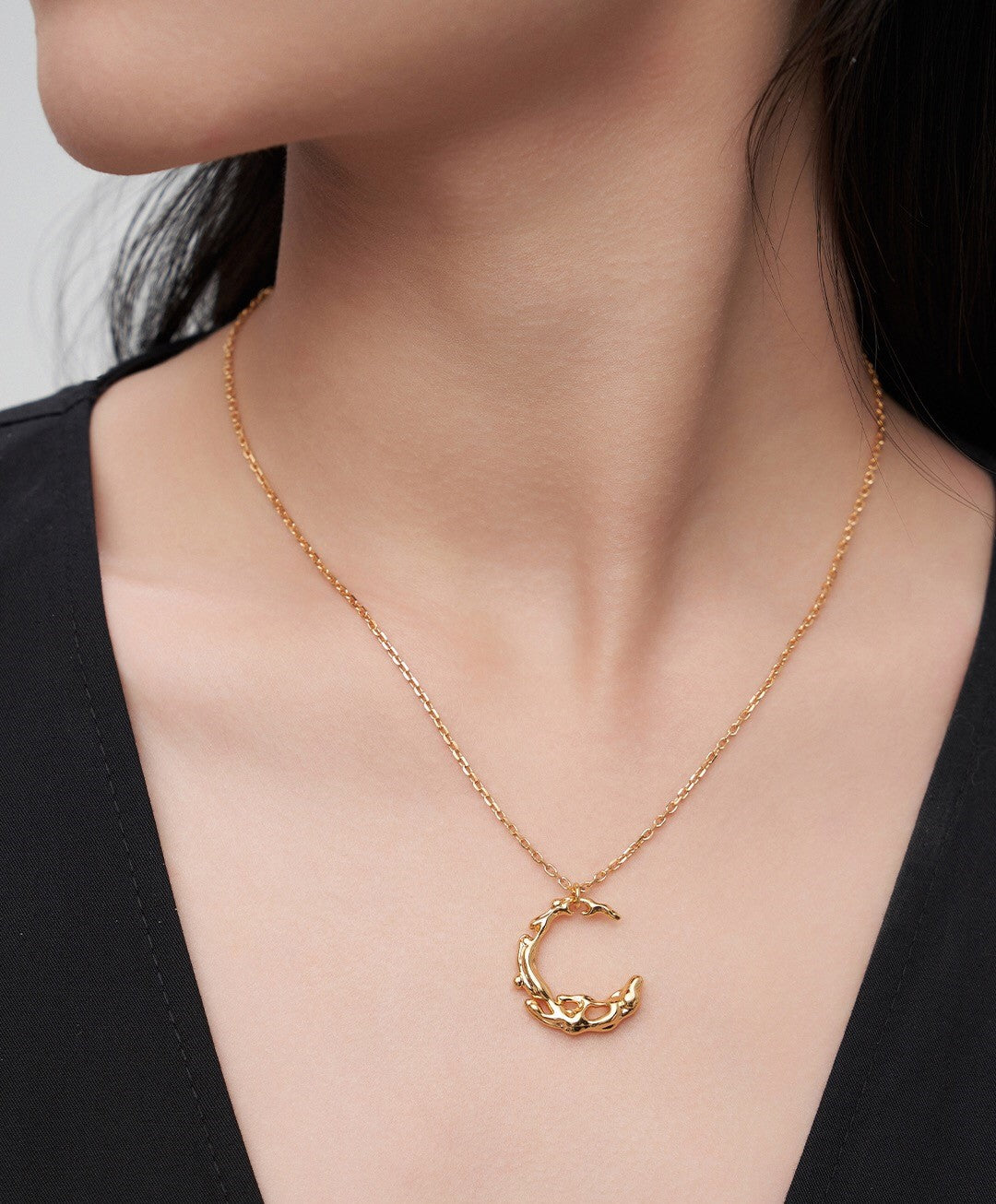 Irregular Water Flow Moon Necklace featuring freshwater pearls and gold vermeil pendant, elegantly displayed on a soft background.