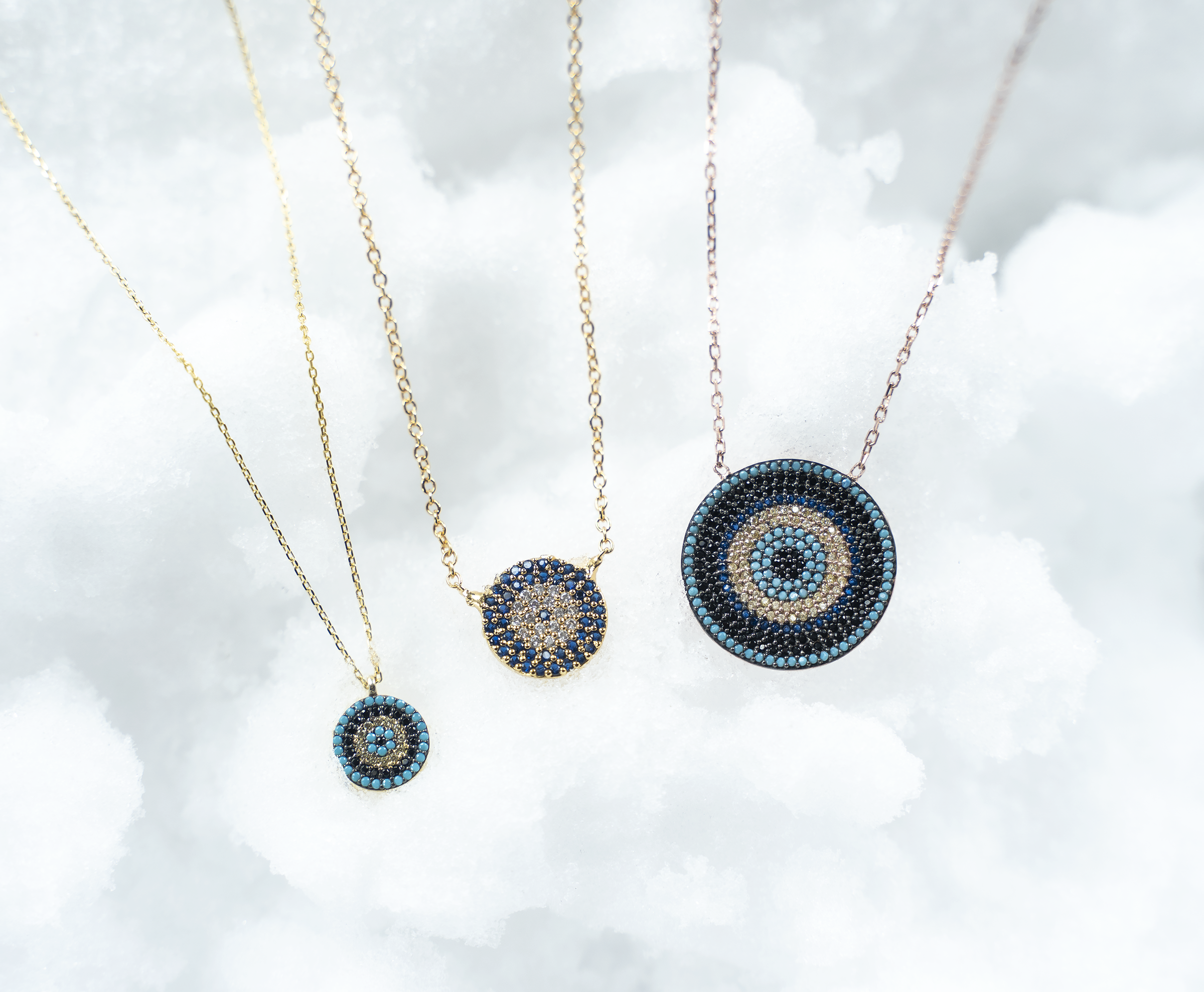 IREM Necklace featuring vibrant cubic zirconia in turquoise, yellow, and blue, crafted from 925 sterling silver with a yellow gold plating.