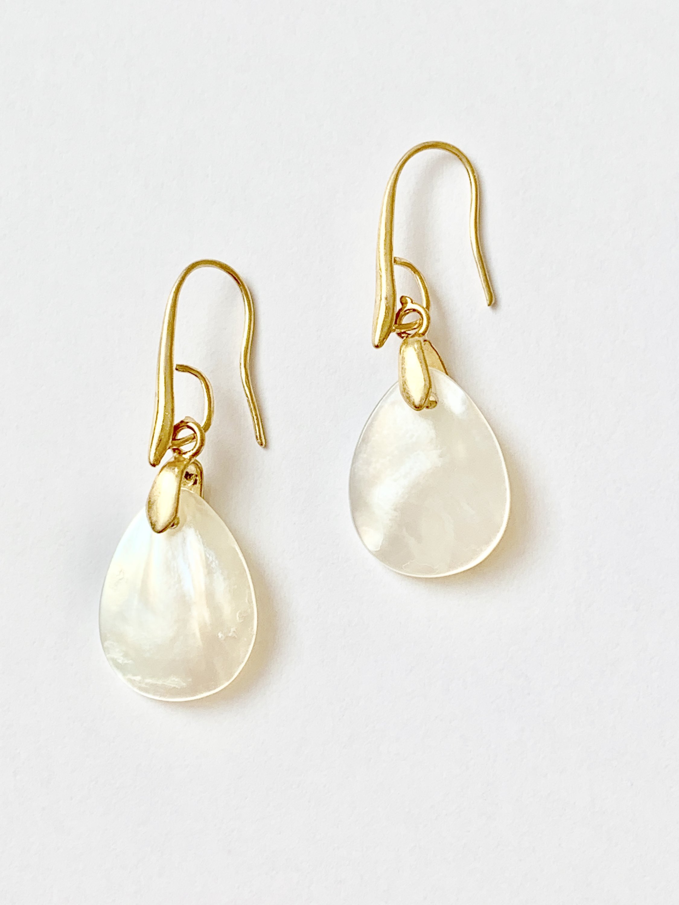 Elegant iridescent natural shell dangle earrings for women, featuring gold plating and fish hook backs.