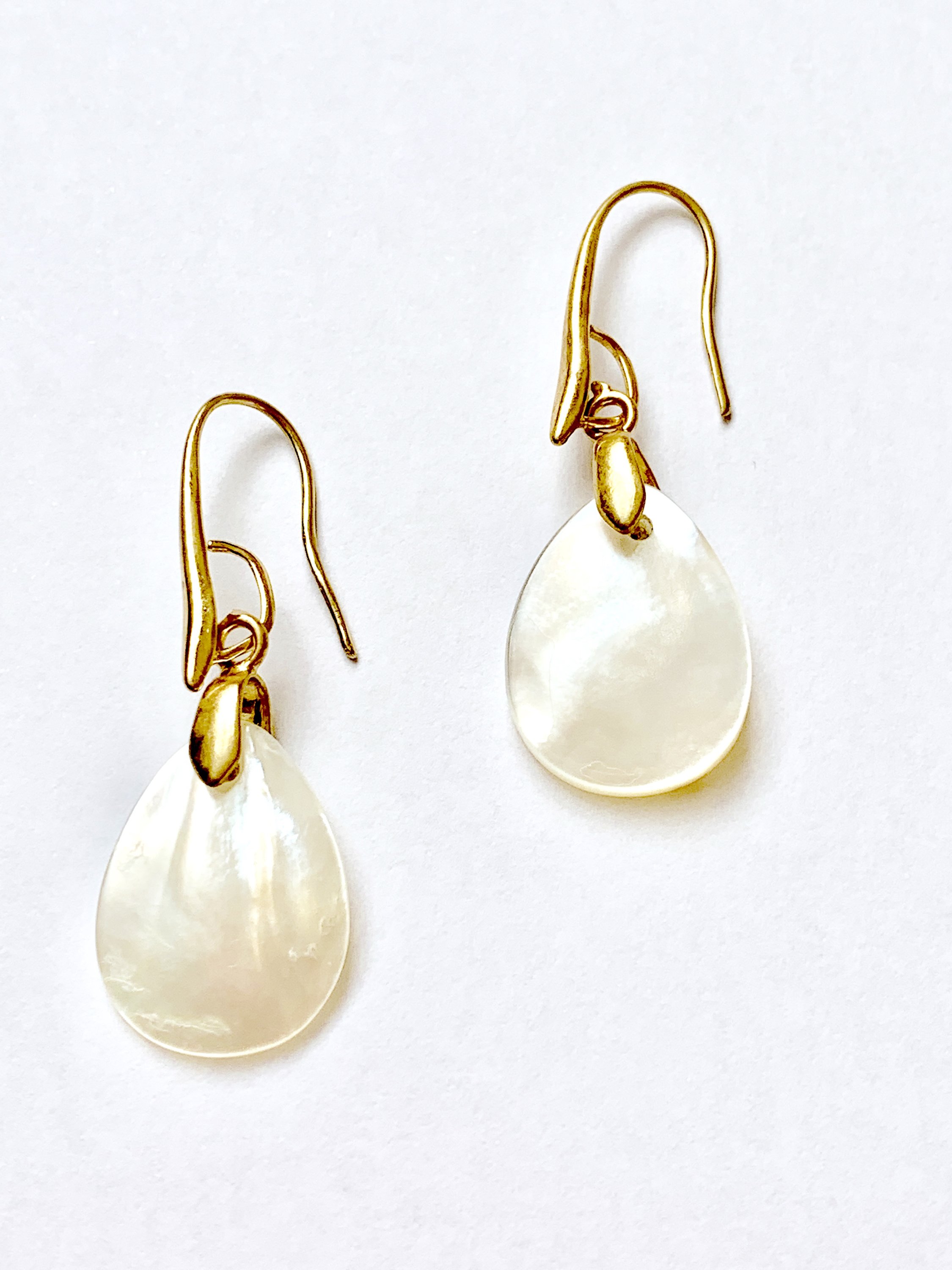 Elegant iridescent natural shell dangle earrings for women, featuring gold plating and fish hook backs.