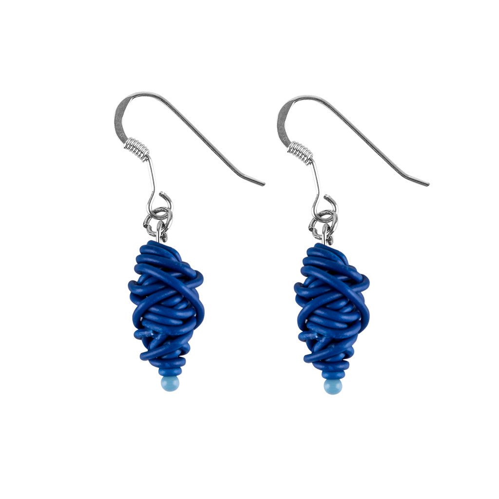 Isla Recycled Electrical Wire Earrings in four vibrant colors, featuring delicate beads and sterling silver hooks, elegantly displayed in a luxury gift box.