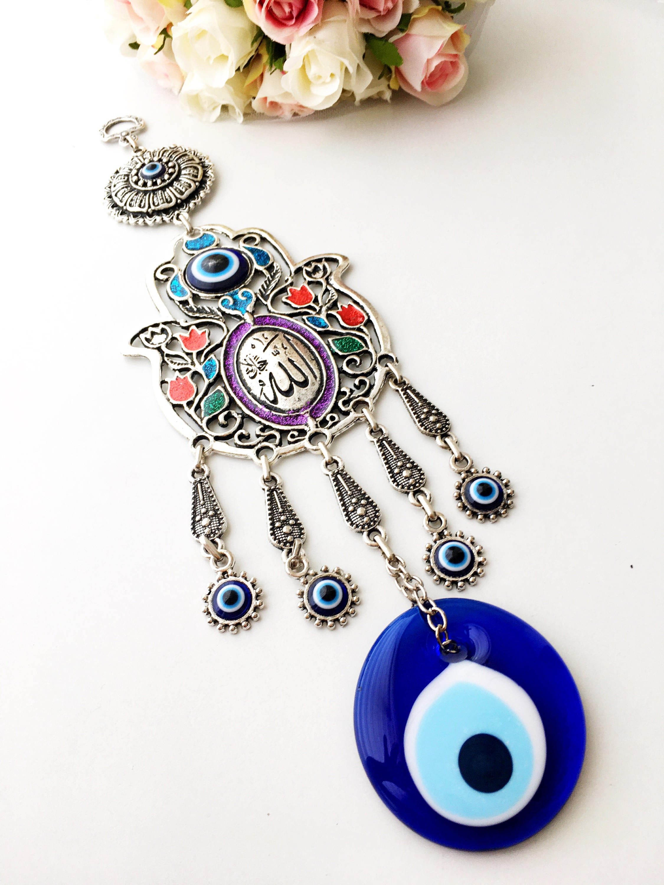 Islamic Tulip Evil Eye Wall Hanging featuring a mosaic hamsa hand and large evil eye bead, symbolizing protection and good luck.