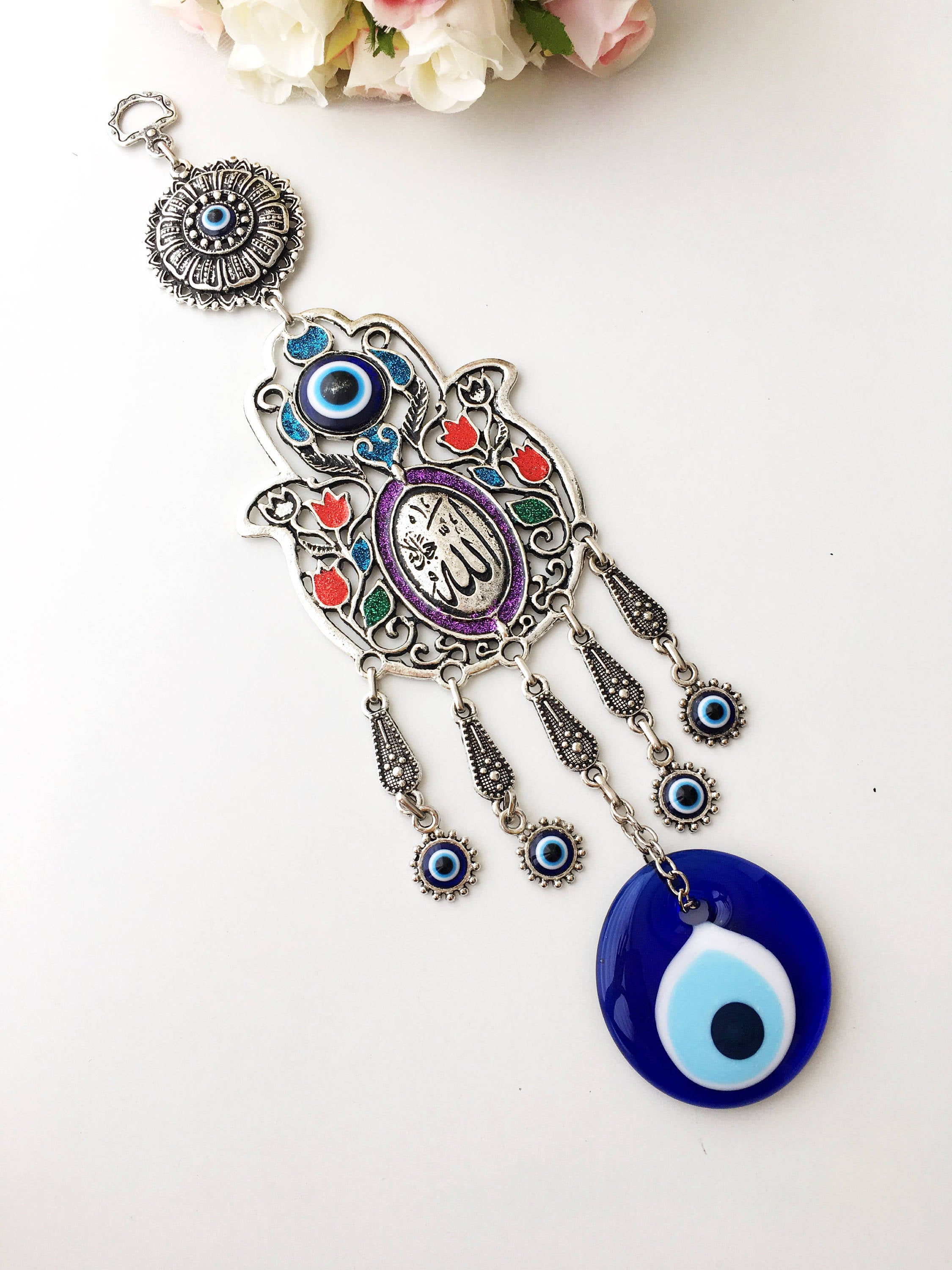 Islamic Tulip Evil Eye Wall Hanging featuring a mosaic hamsa hand and large evil eye bead, symbolizing protection and good luck.