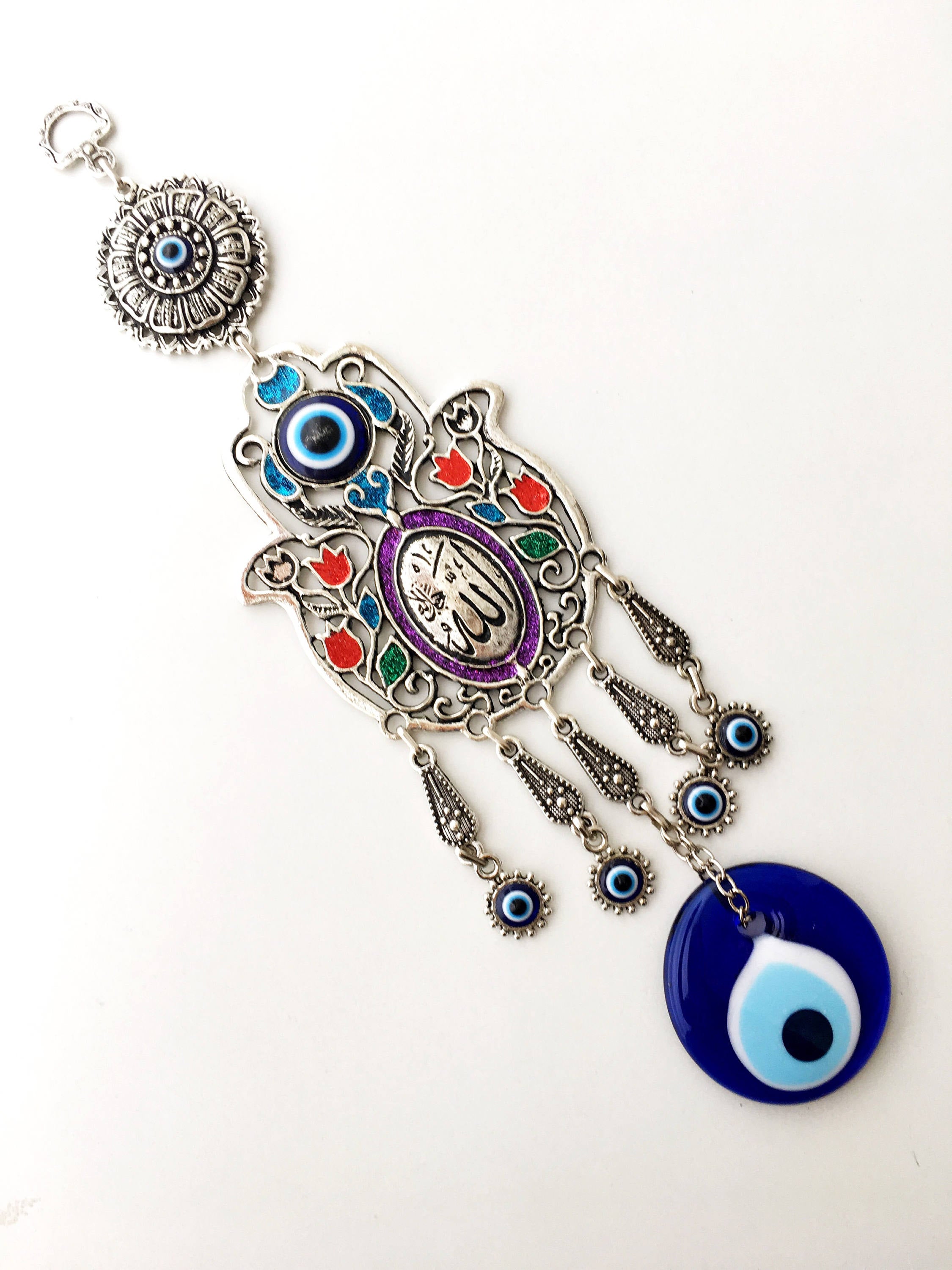 Islamic Tulip Evil Eye Wall Hanging featuring a mosaic hamsa hand and large evil eye bead, symbolizing protection and good luck.