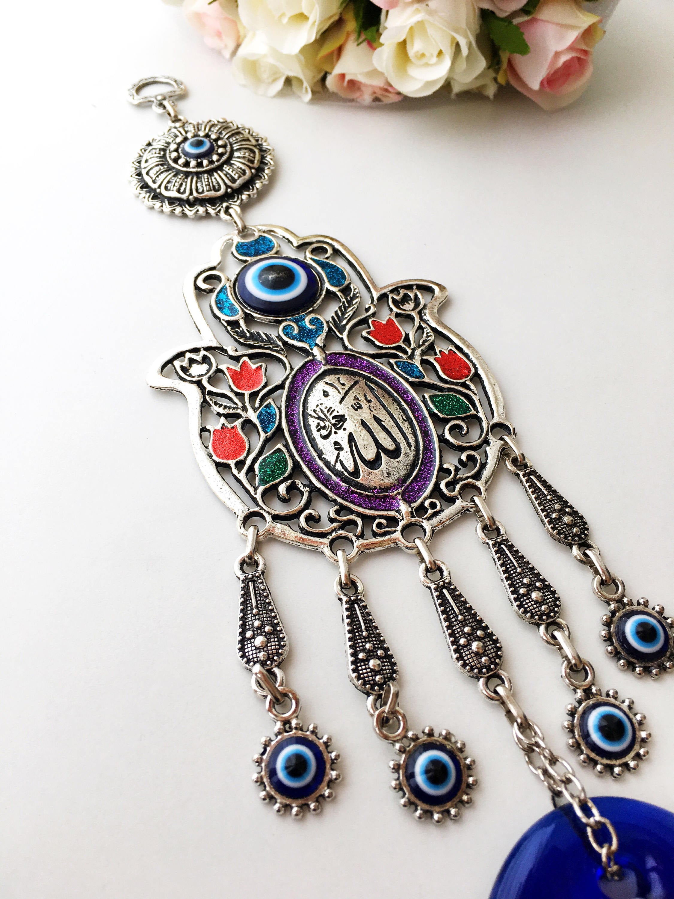 Islamic Tulip Evil Eye Wall Hanging featuring a mosaic hamsa hand and large evil eye bead, symbolizing protection and good luck.