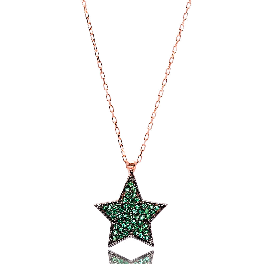 ISRA Star Necklace featuring a star pendant with cubic zirconias on a yellow gold plated sterling silver chain.