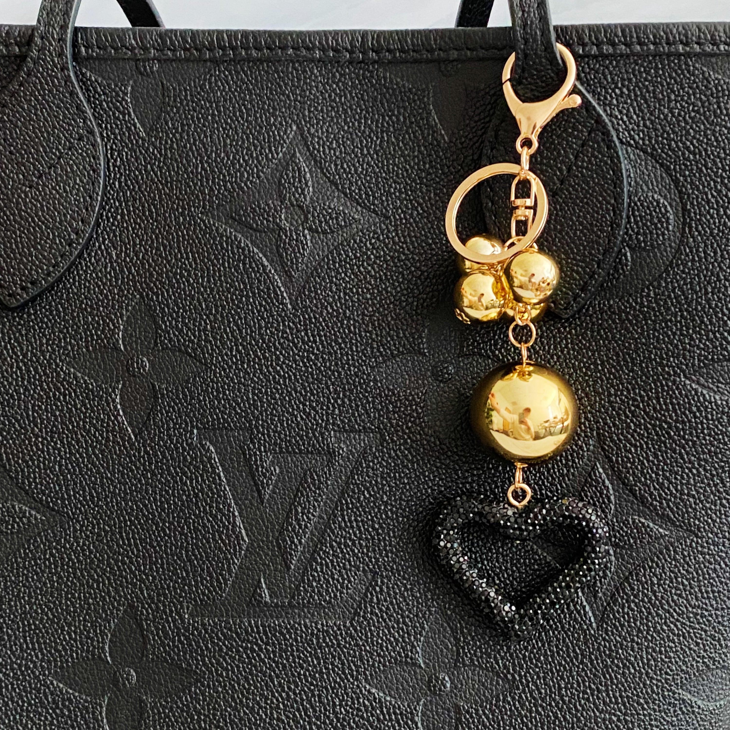 It Girl Glam Heart Bauble Key Chain featuring a stylish heart design, perfect for adding glam to bags and keys.