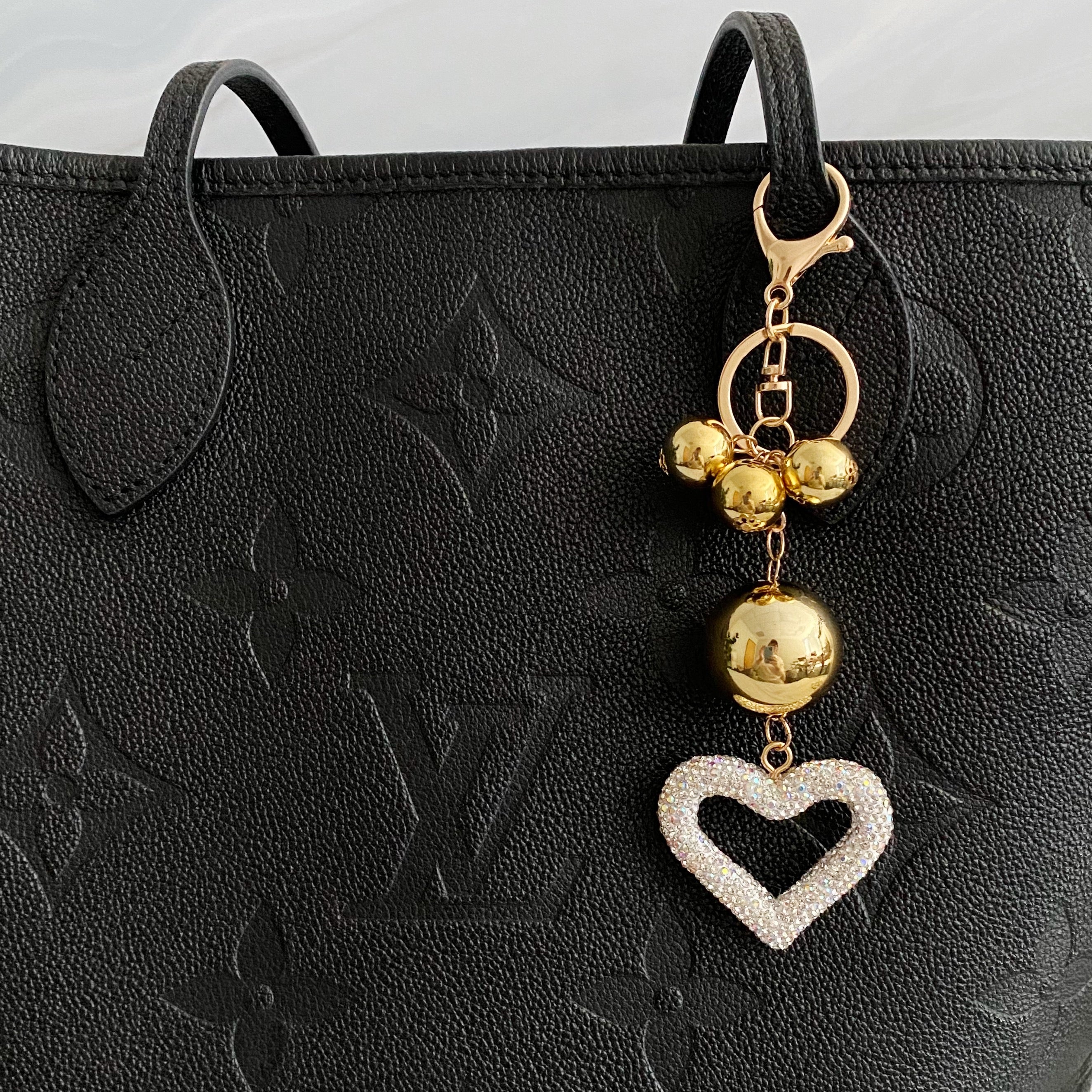 It Girl Glam Heart Bauble Key Chain featuring a stylish heart design, perfect for adding glam to bags and keys.