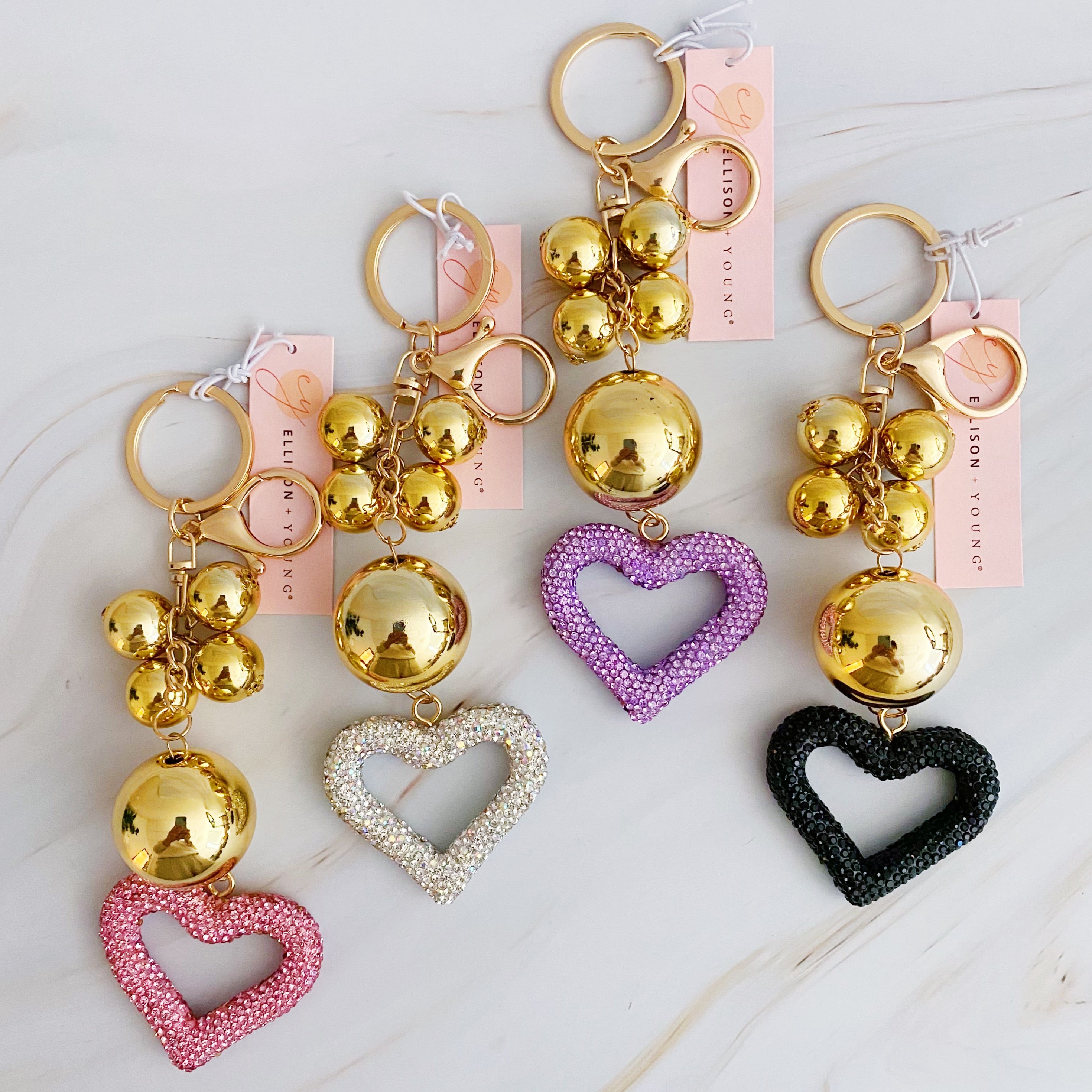 It Girl Glam Heart Bauble Key Chain featuring a stylish heart design, perfect for adding glam to bags and keys.