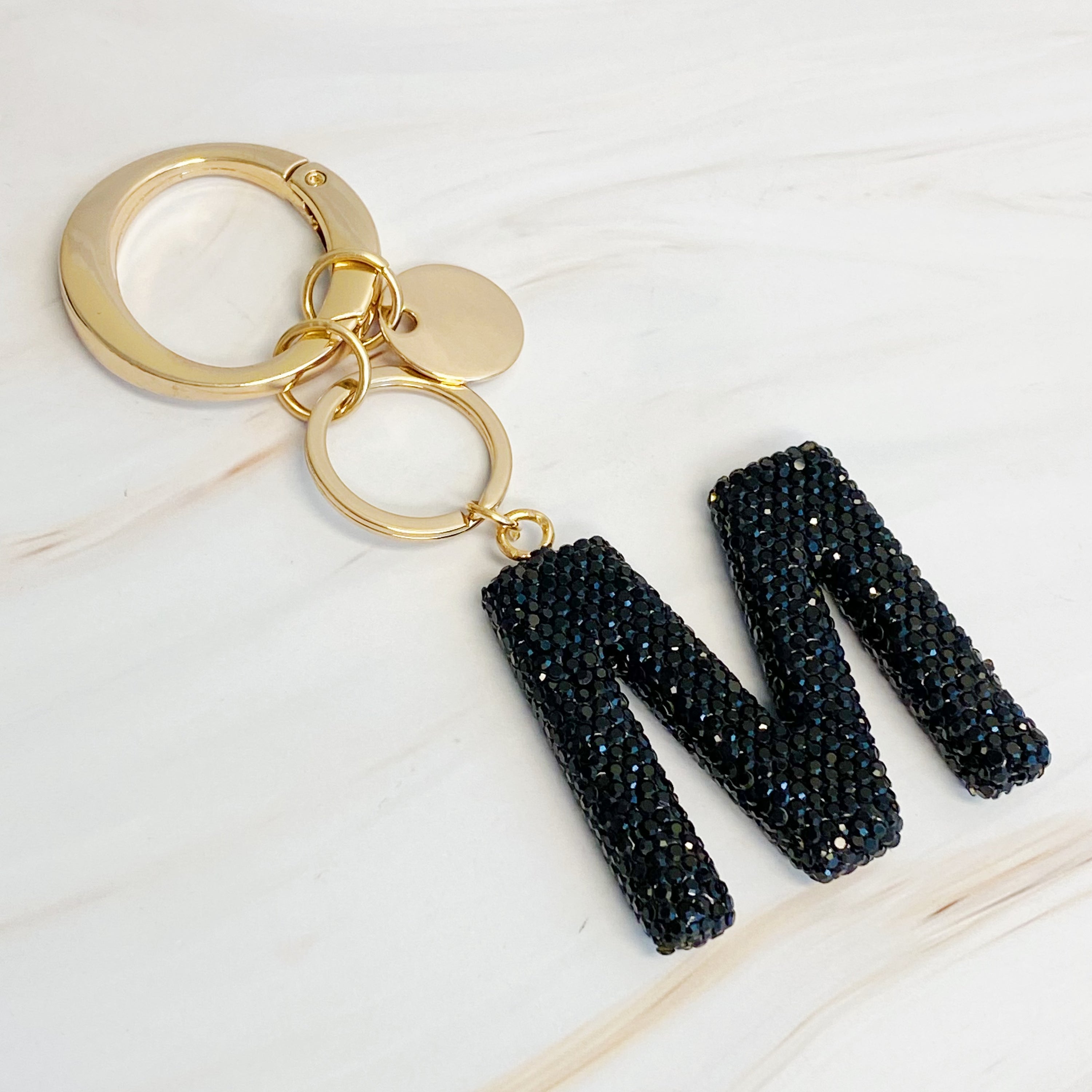 It Girl Glam Initial Key Chain featuring a stylish initial design, perfect for personal expression and gifting.