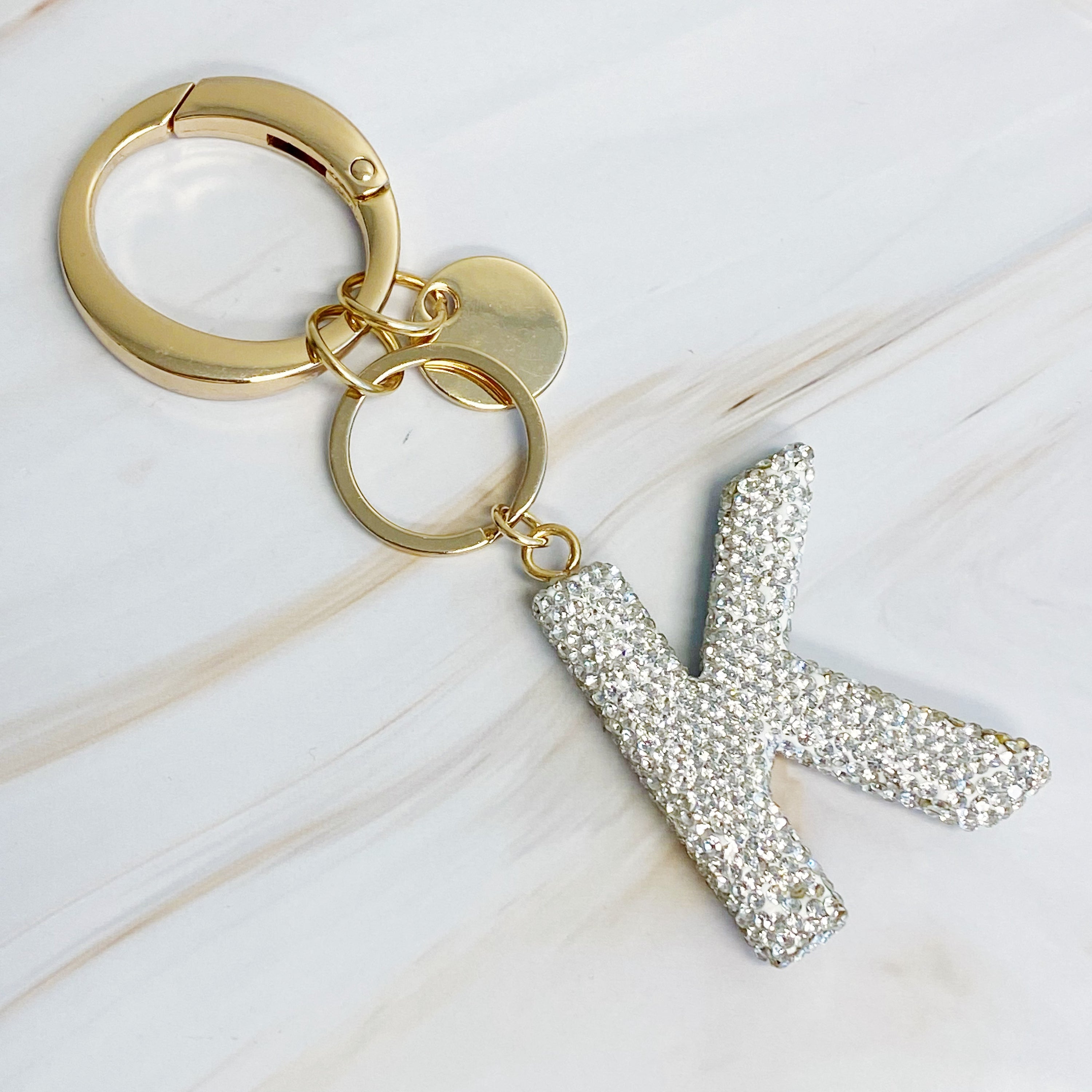 It Girl Glam Initial Key Chain featuring a stylish initial design, perfect for personal expression and gifting.