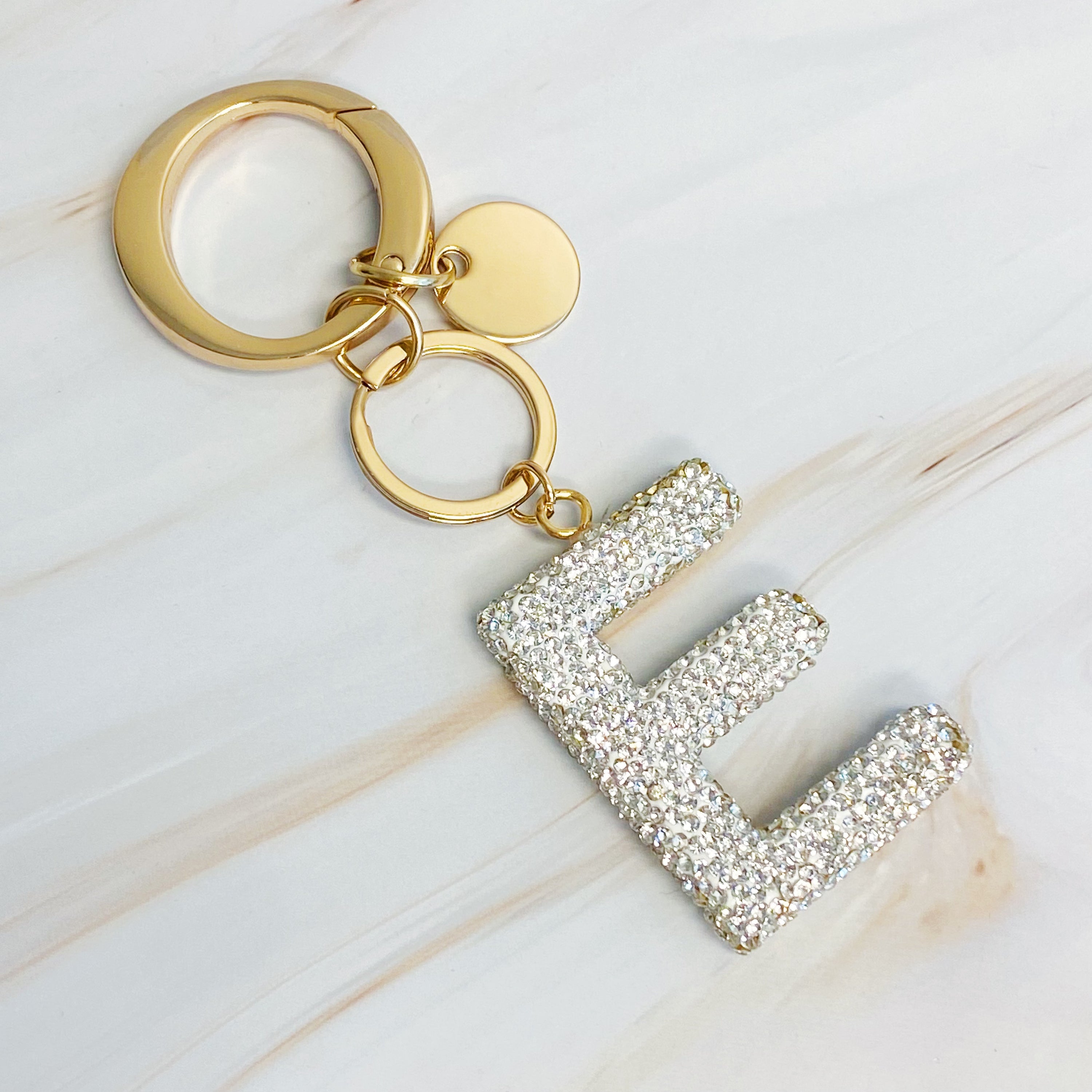 It Girl Glam Initial Key Chain featuring a stylish initial design, perfect for personal expression and gifting.