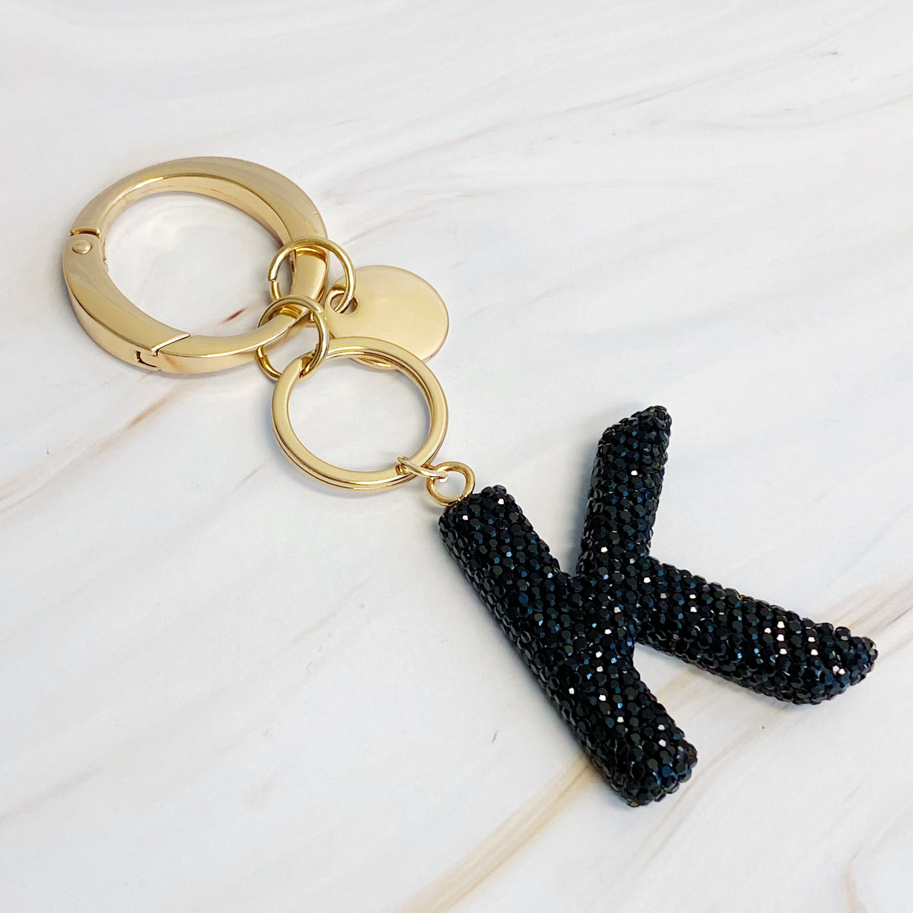 It Girl Glam Initial Key Chain featuring a stylish initial design, perfect for personal expression and gifting.