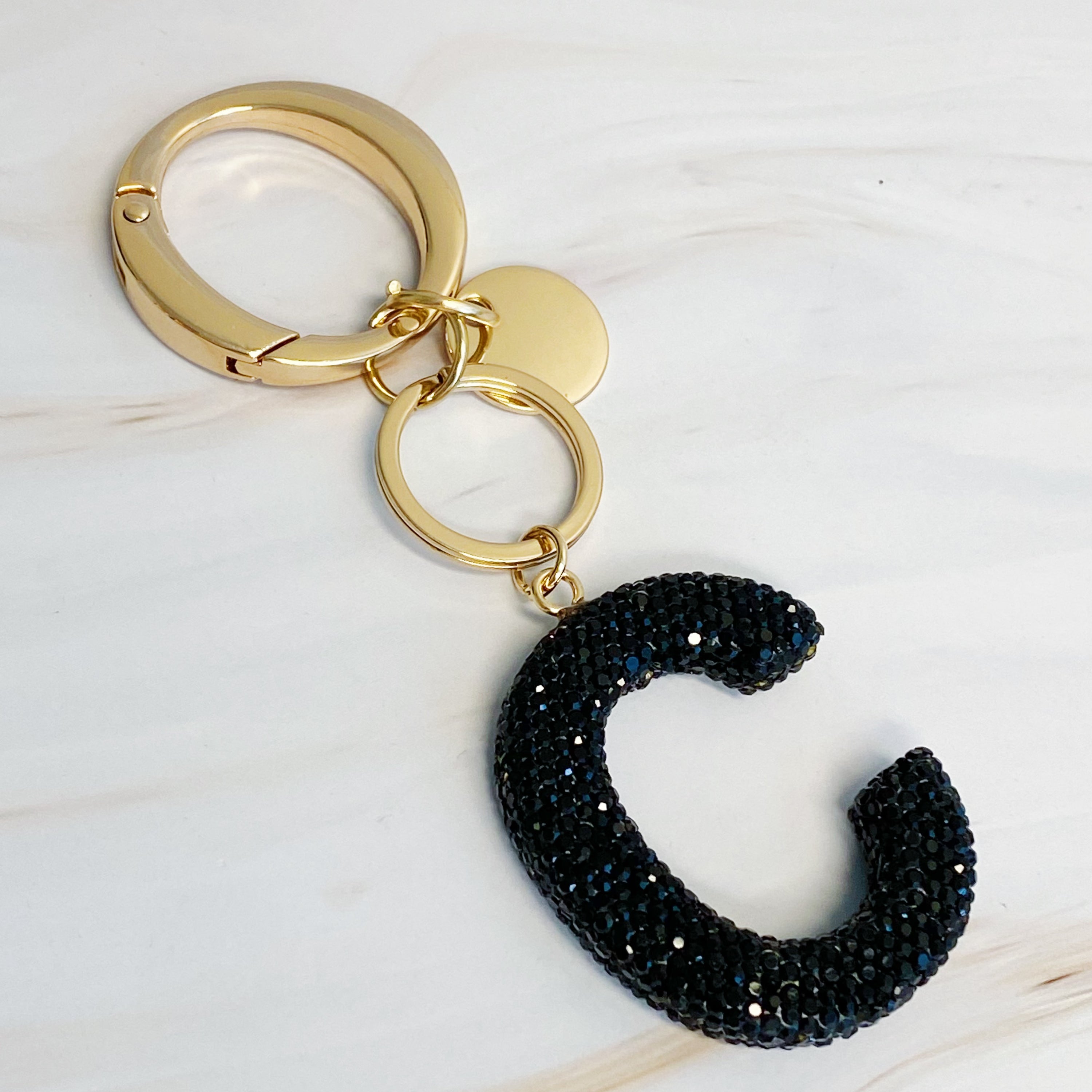 It Girl Glam Initial Key Chain featuring a stylish initial design, perfect for personal expression and gifting.