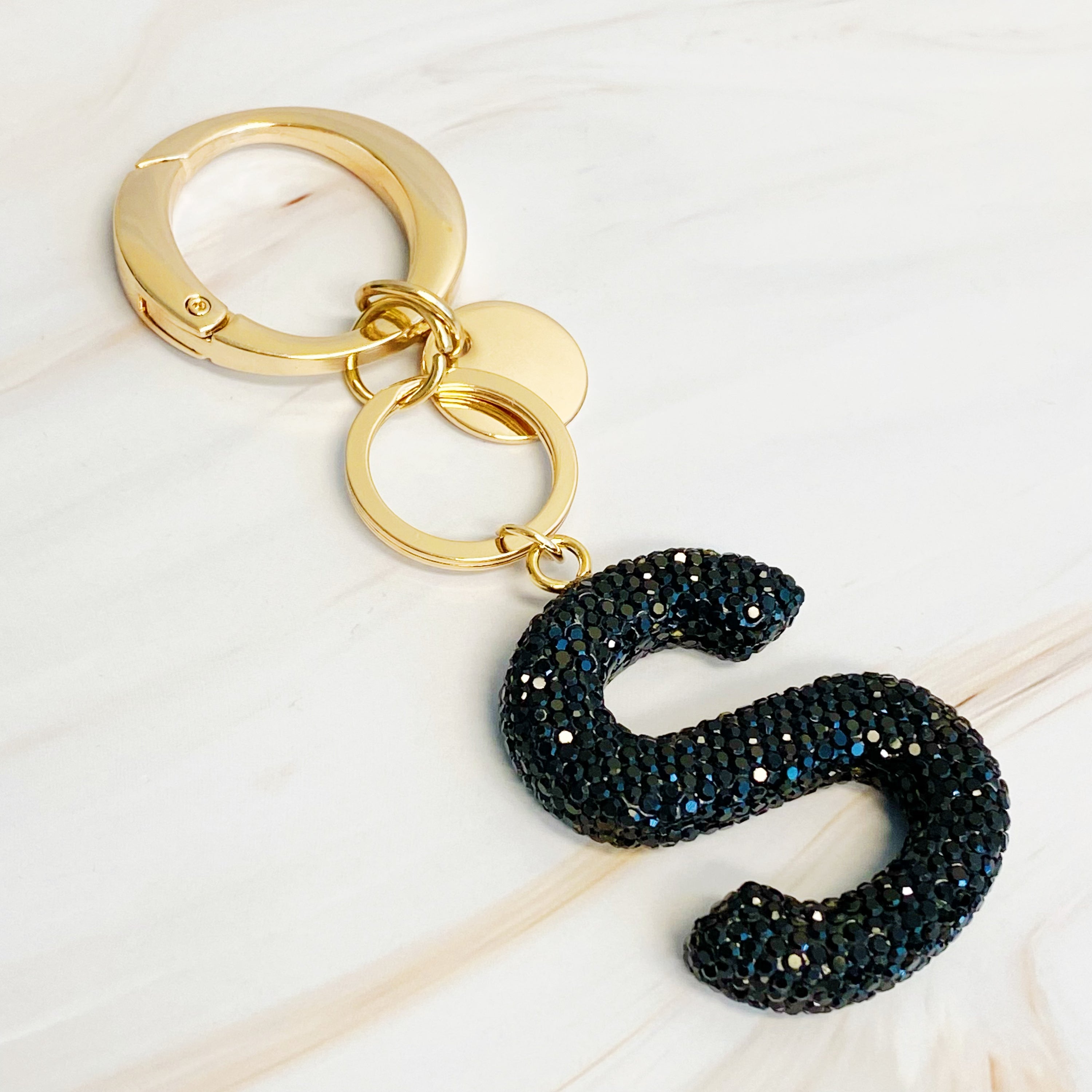 It Girl Glam Initial Key Chain featuring a stylish initial design, perfect for personal expression and gifting.