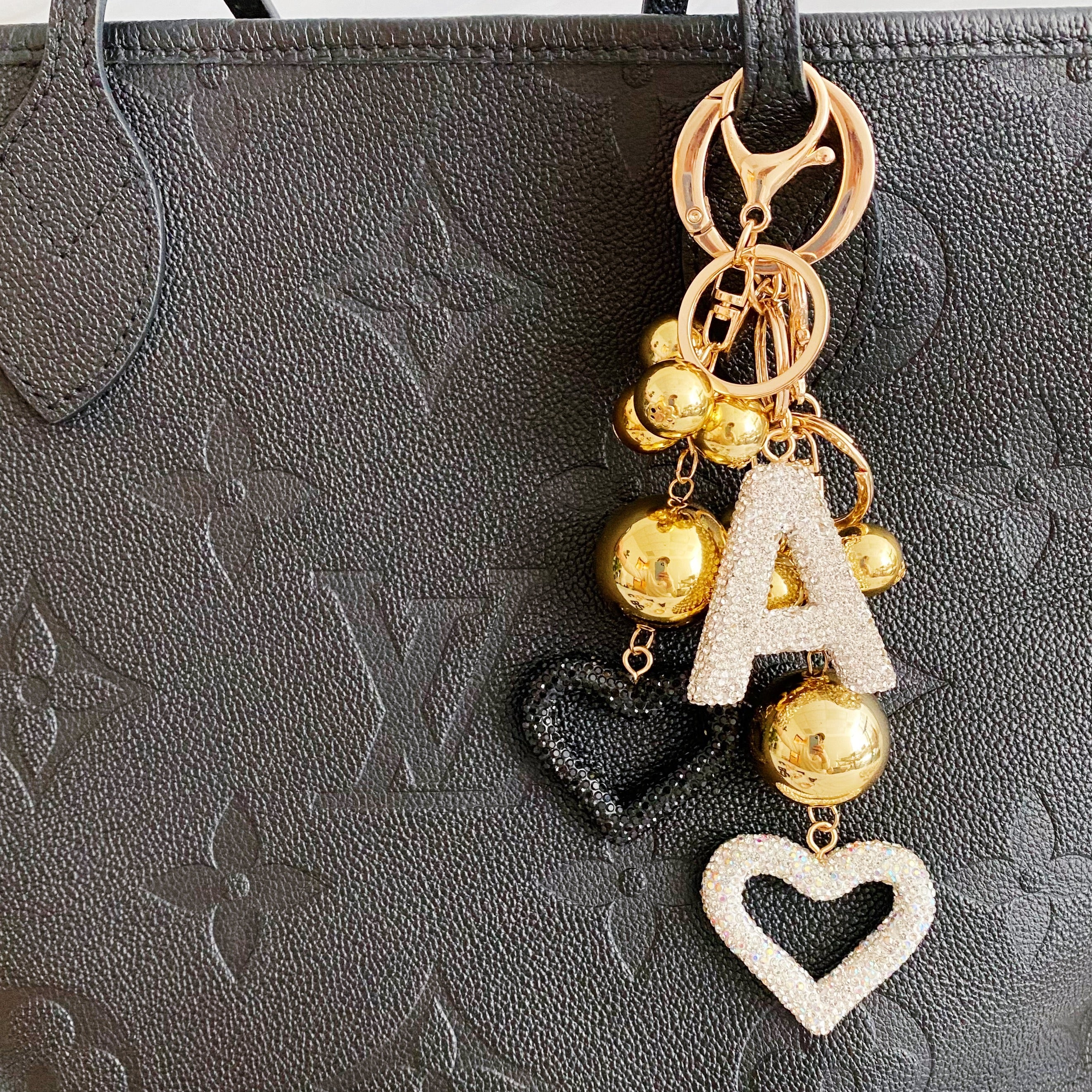 It Girl Glam Initial Key Chain featuring a stylish initial design, perfect for personal expression and gifting.