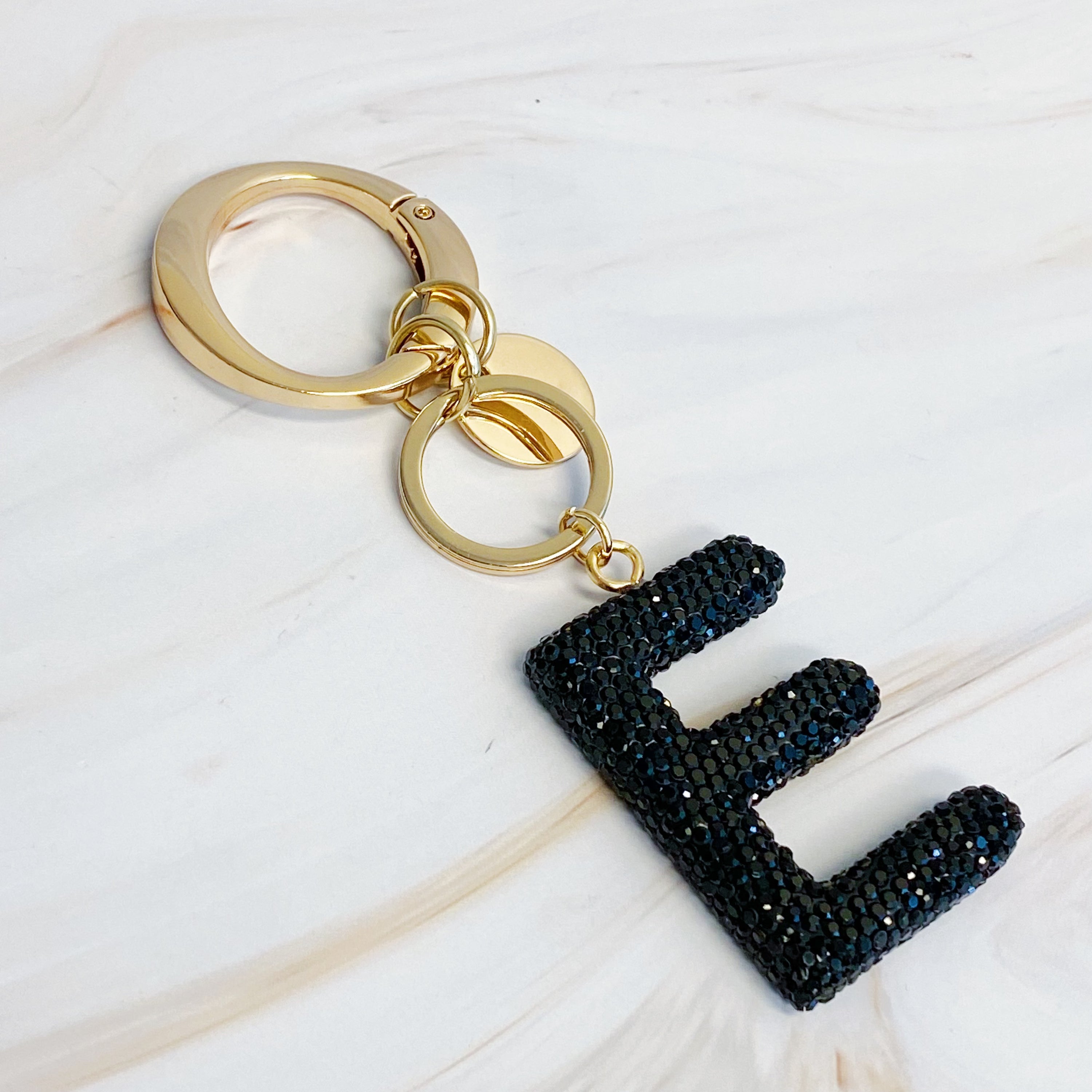 It Girl Glam Initial Key Chain featuring a stylish initial design, perfect for personal expression and gifting.