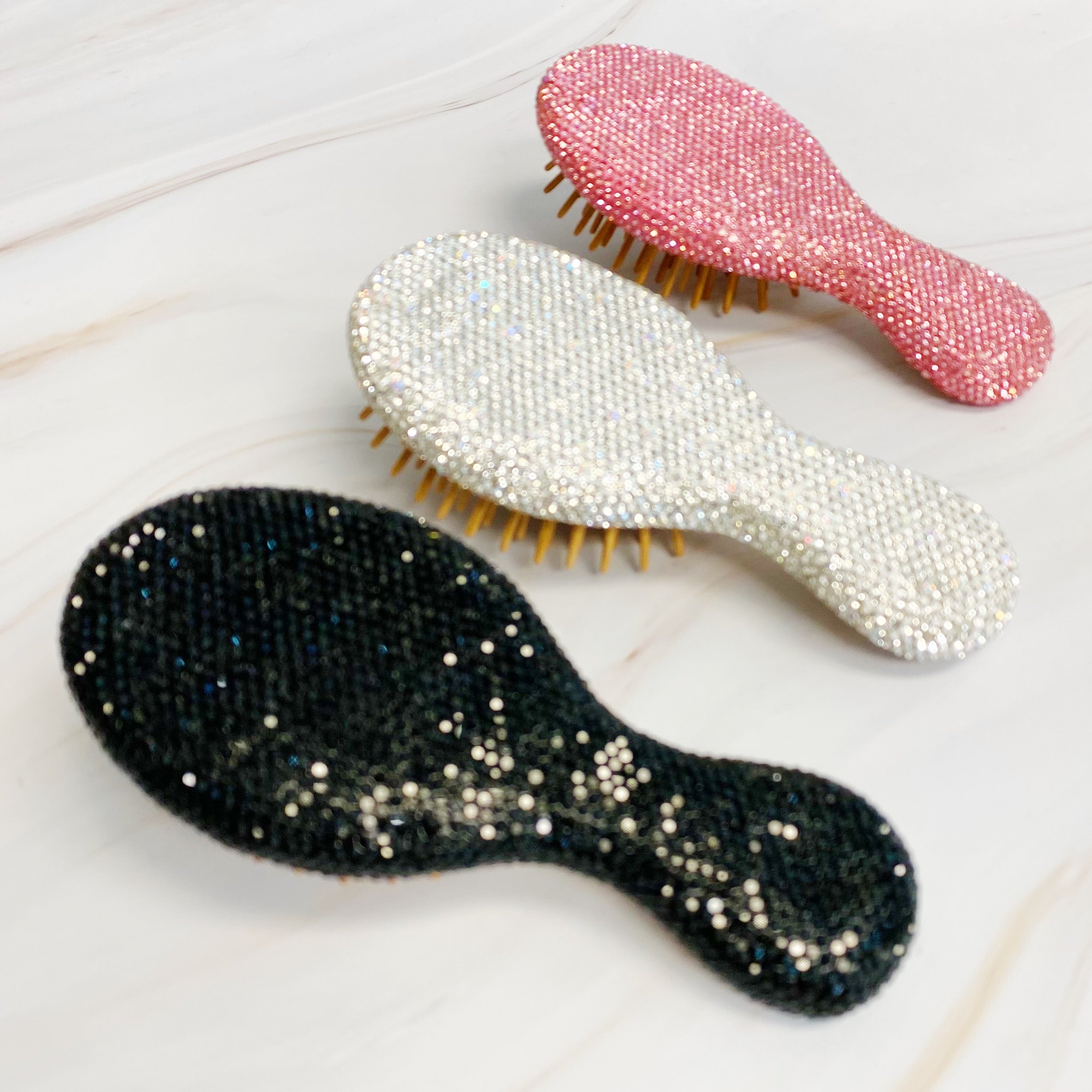 It Girl Life Glam Hair Brush featuring sparkling rhinestones and wooden bristles, perfect for stylish hair care.