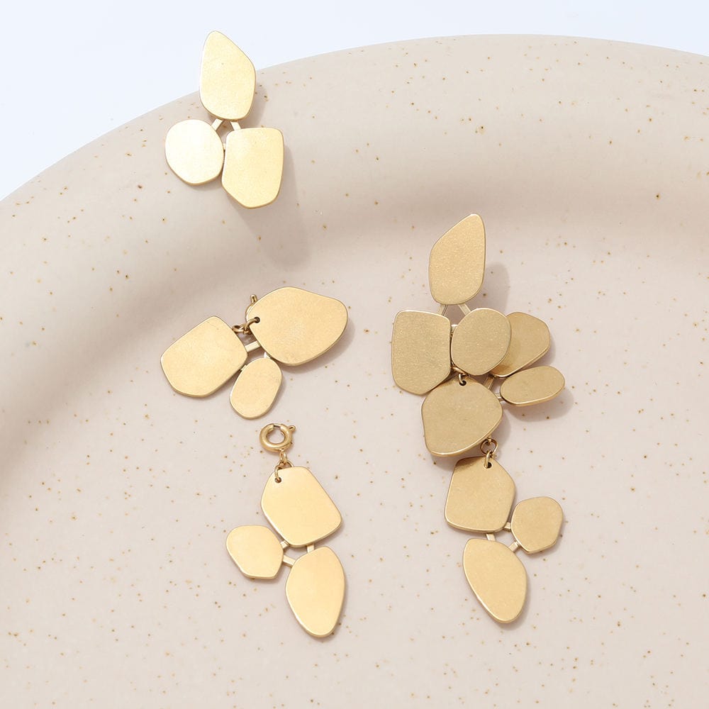 Ivy Leaf Dangle Earrings featuring a chandelier design with geometric shapes in matte 18Kt yellow gold over titanium steel.