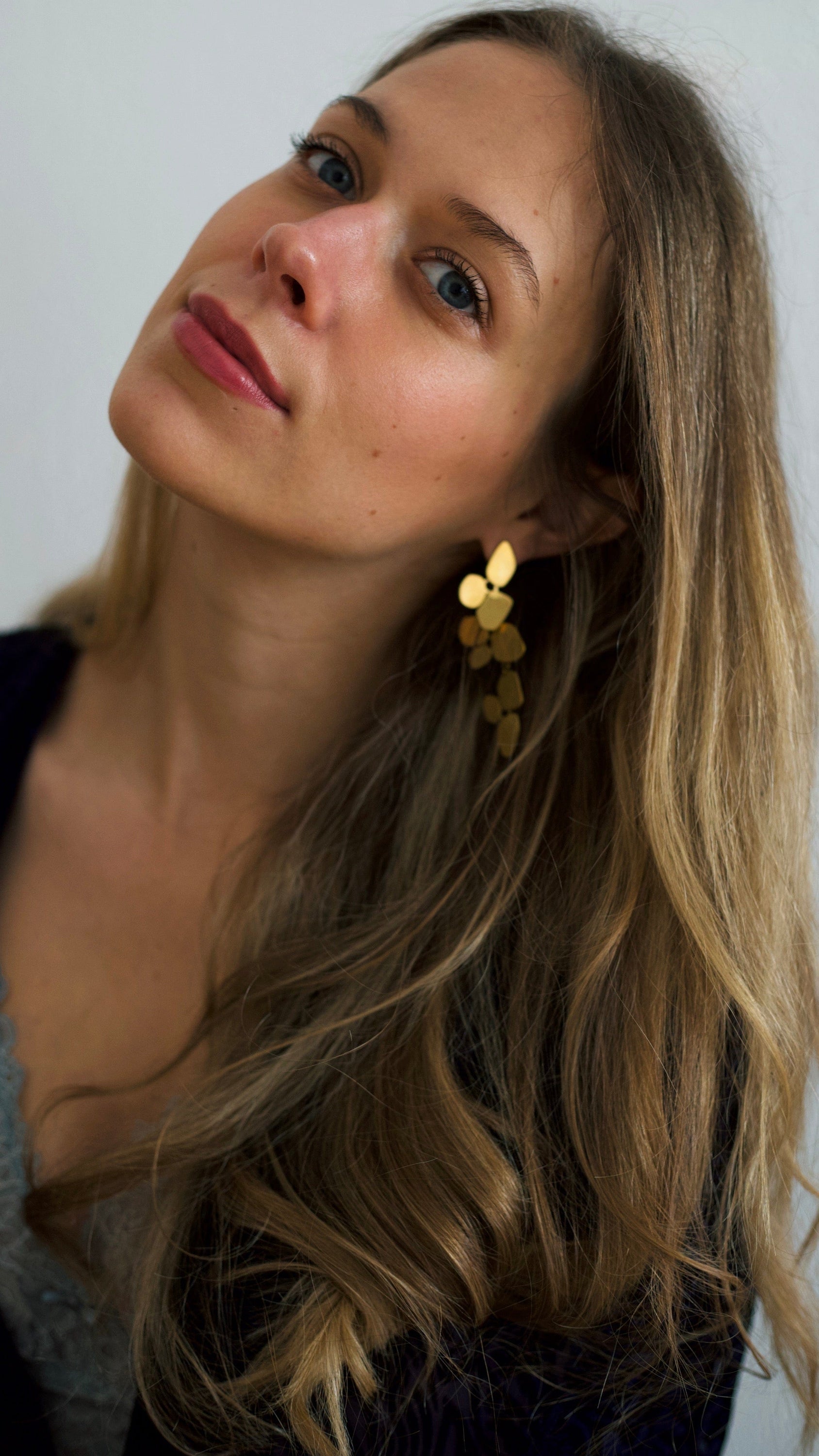 Ivy Leaf Dangle Earrings featuring a chandelier design with geometric shapes in matte 18Kt yellow gold over titanium steel.