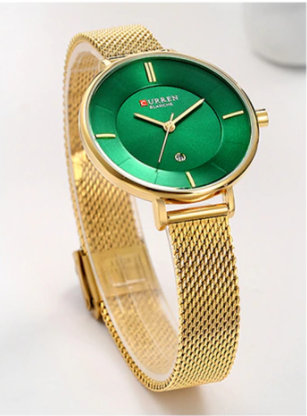 Jade Curren Women Watch featuring an emerald green dial and a luxurious gold textured band, showcasing elegance and sophistication.