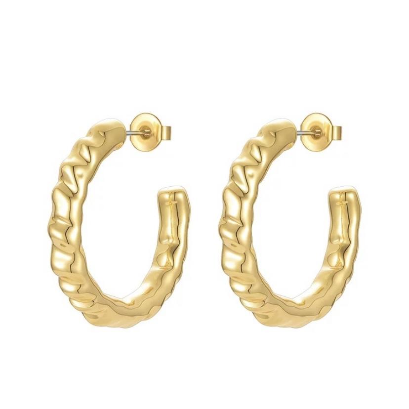 A pair of elegant 2-inch hammered hoop earrings, showcasing a unique textured design.