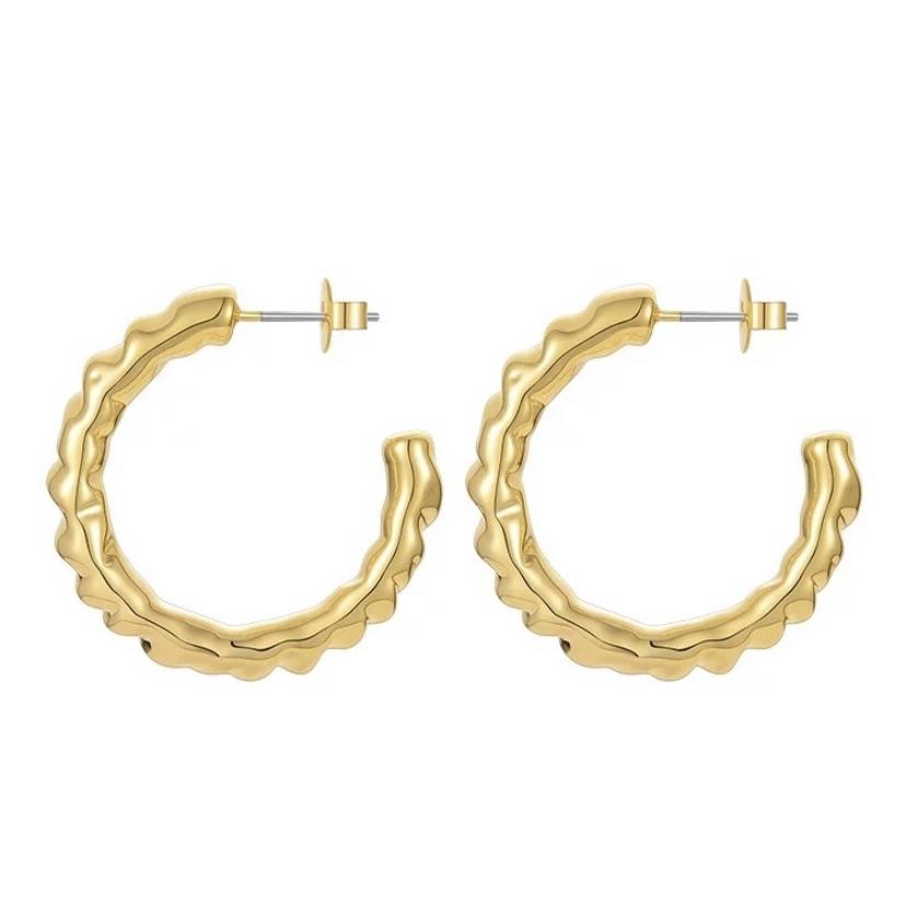 A pair of elegant 2-inch hammered hoop earrings, showcasing a unique textured design.