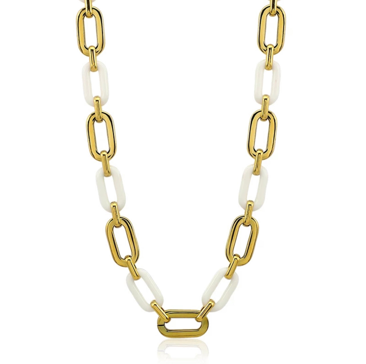 Jenna Acrylic Necklace in white with gold-plated stainless steel links, elegantly displayed on a soft background.