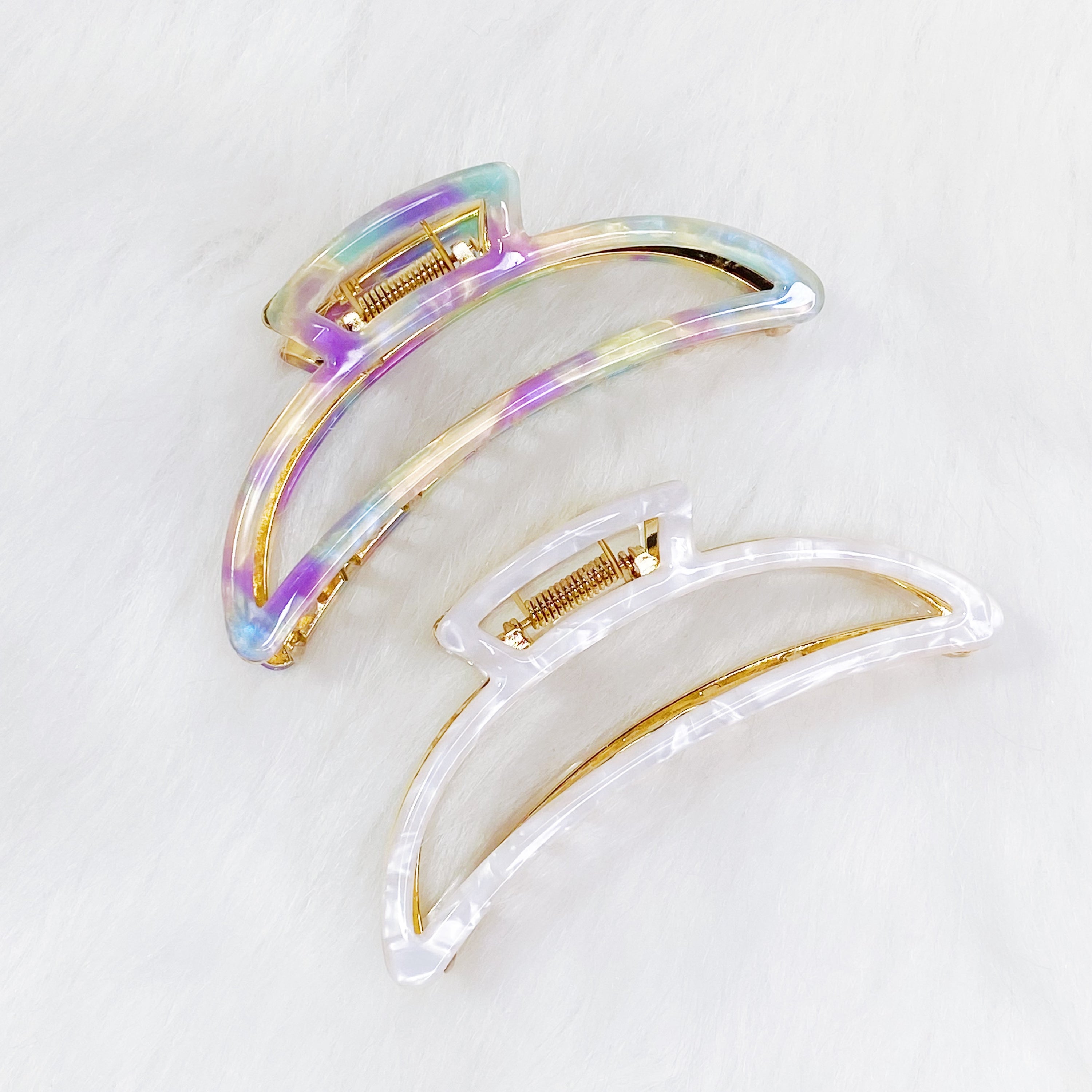 Jenna Half Moon Hair Claw featuring a chic gold tone design, perfect for securing various hair types.