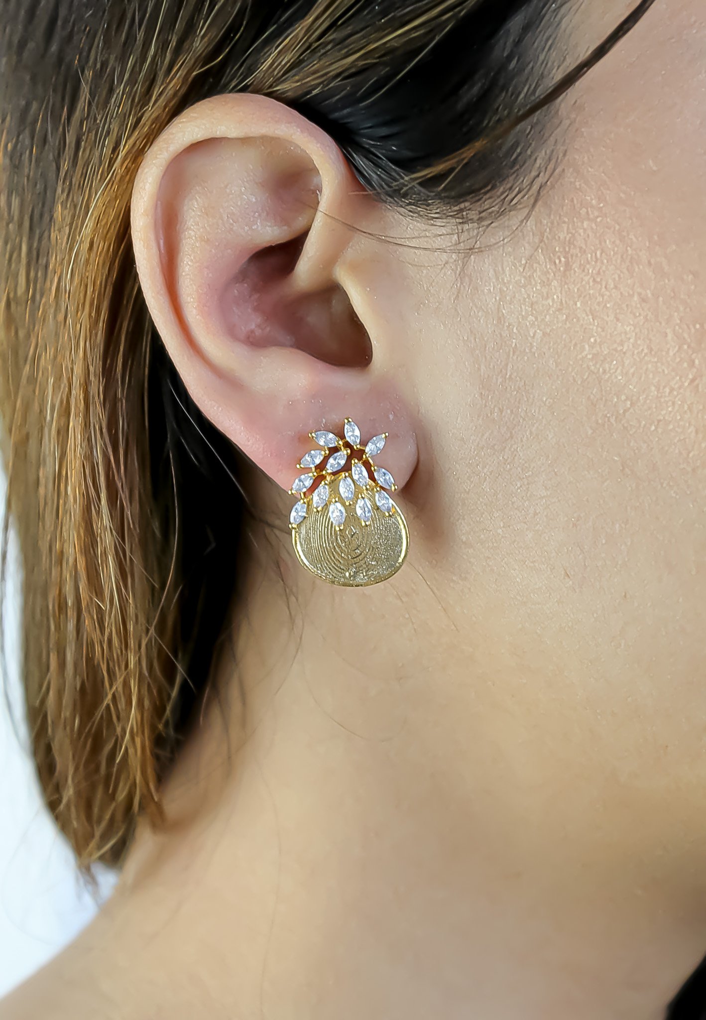 A pair of Jolly Pineapple Earrings featuring gold plating and sparkling encrusted crystals, designed for pierced ears.