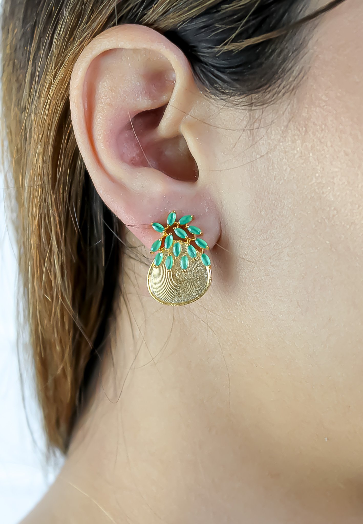 A pair of Jolly Pineapple Earrings featuring gold plating and sparkling encrusted crystals, designed for pierced ears.