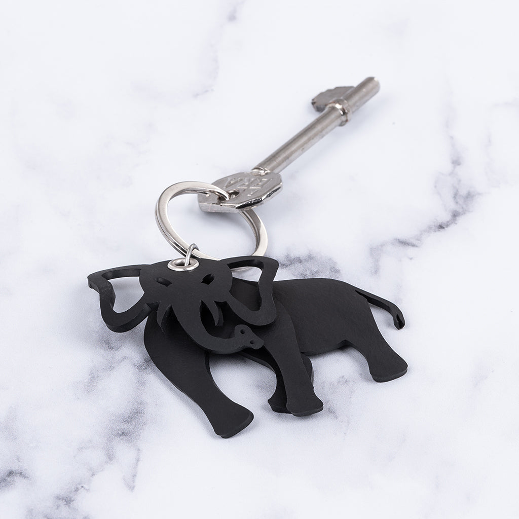 A colorful Jumbo 3D Recycled Rubber Elephant Vegan Keyring, handmade from recycled materials, showcasing a charming elephant design.