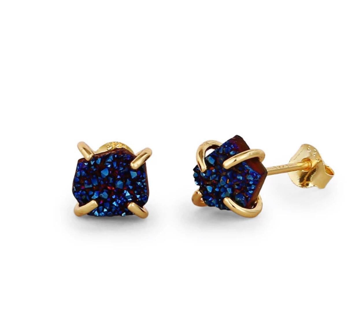 A pair of handmade druzy stud earrings featuring Sterling Silver and 24K gold plating, showcasing sparkling crystals in various colors.