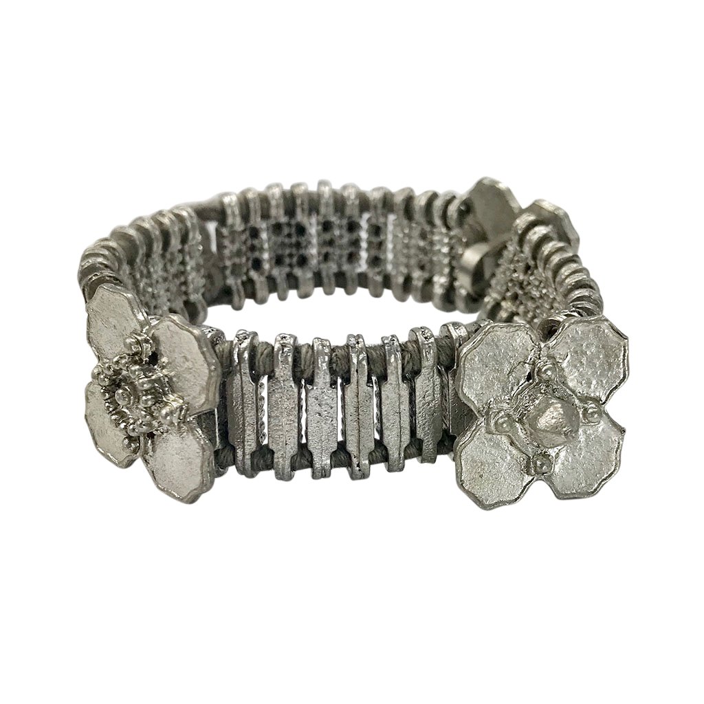 Kali Flower Bracelet featuring handwoven metal beads and cotton threads, showcasing a blend of traditional Indian and modern bohemian design.