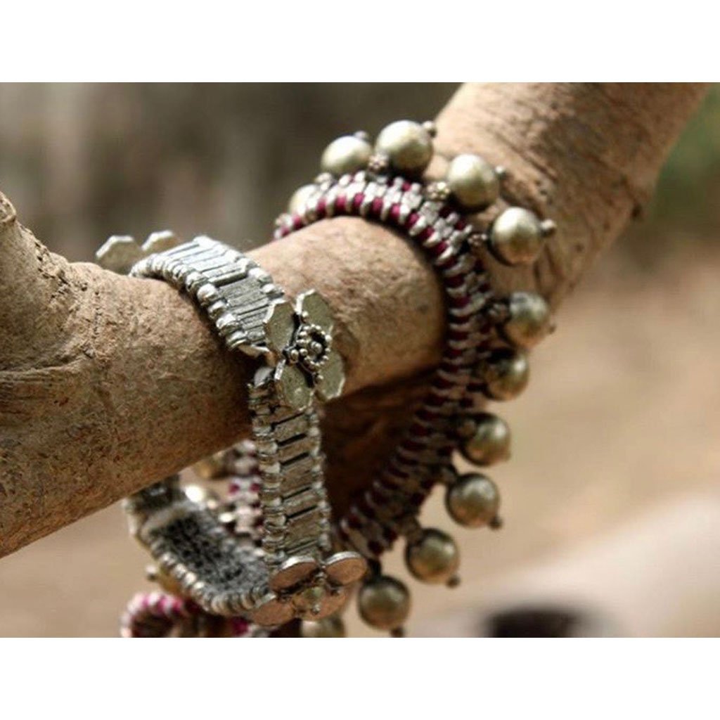 Kali Flower Bracelet featuring handwoven metal beads and cotton threads, showcasing a blend of traditional Indian and modern bohemian design.