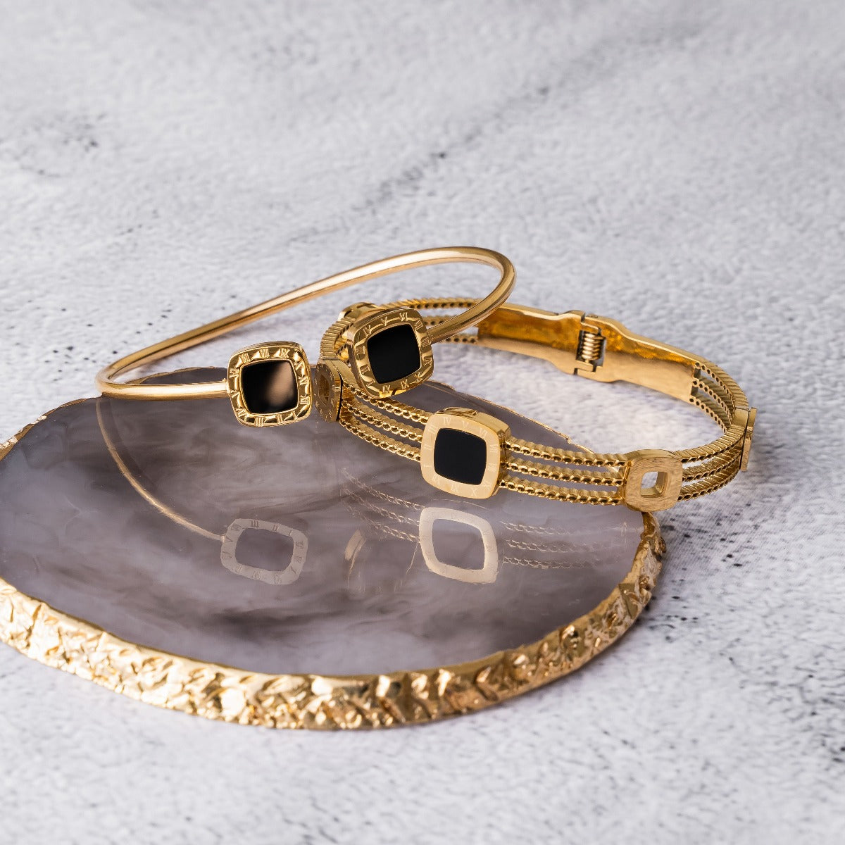 Kaltham Onyx Square Bangle Bracelet in gold, showcasing its elegant design and durable stainless steel material.