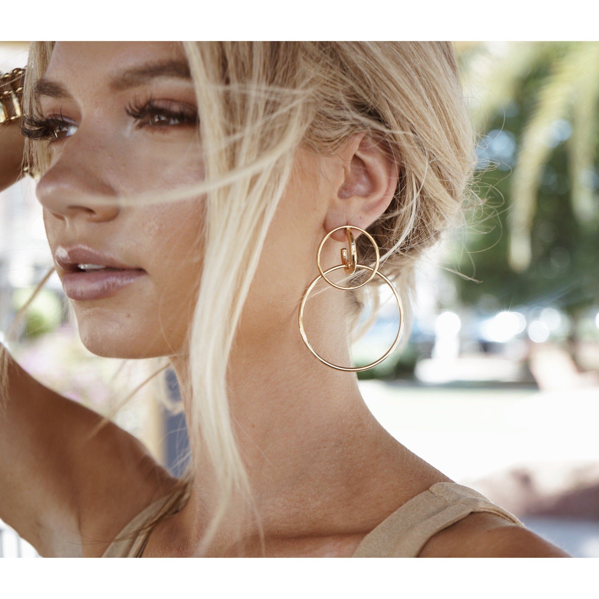 Kara Double Hoop earrings, 3 inches long, featuring a stylish double hoop design in a shiny finish.