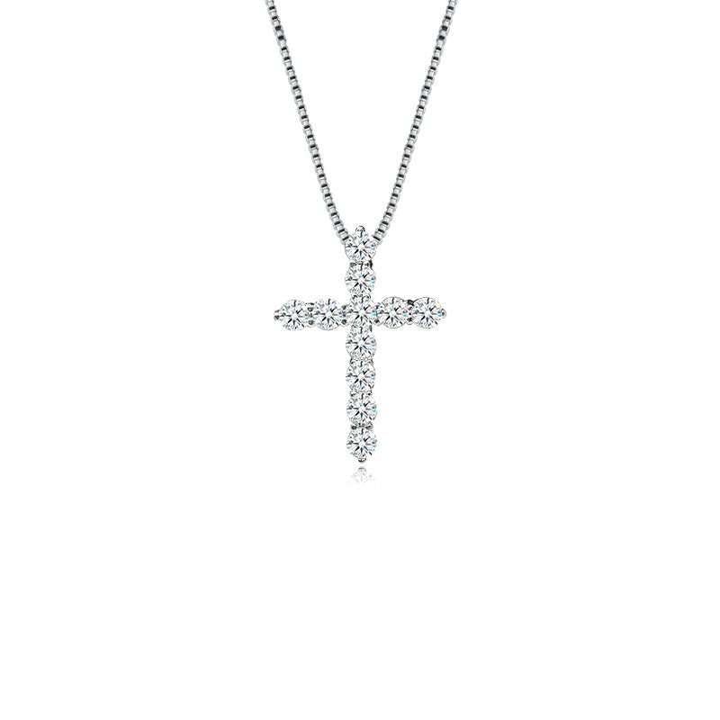 A stunning cross necklace made of 925 sterling silver, featuring a polished finish and adorned with sparkling cubic zirconia stones.