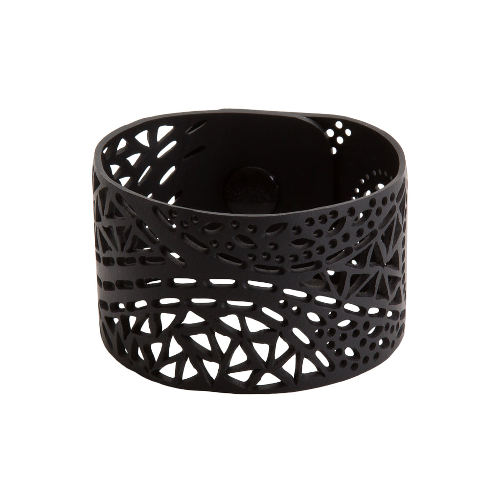 Kiky Unique Recycled Rubber Bracelet showcasing unique graphic patterns and eco-friendly materials.